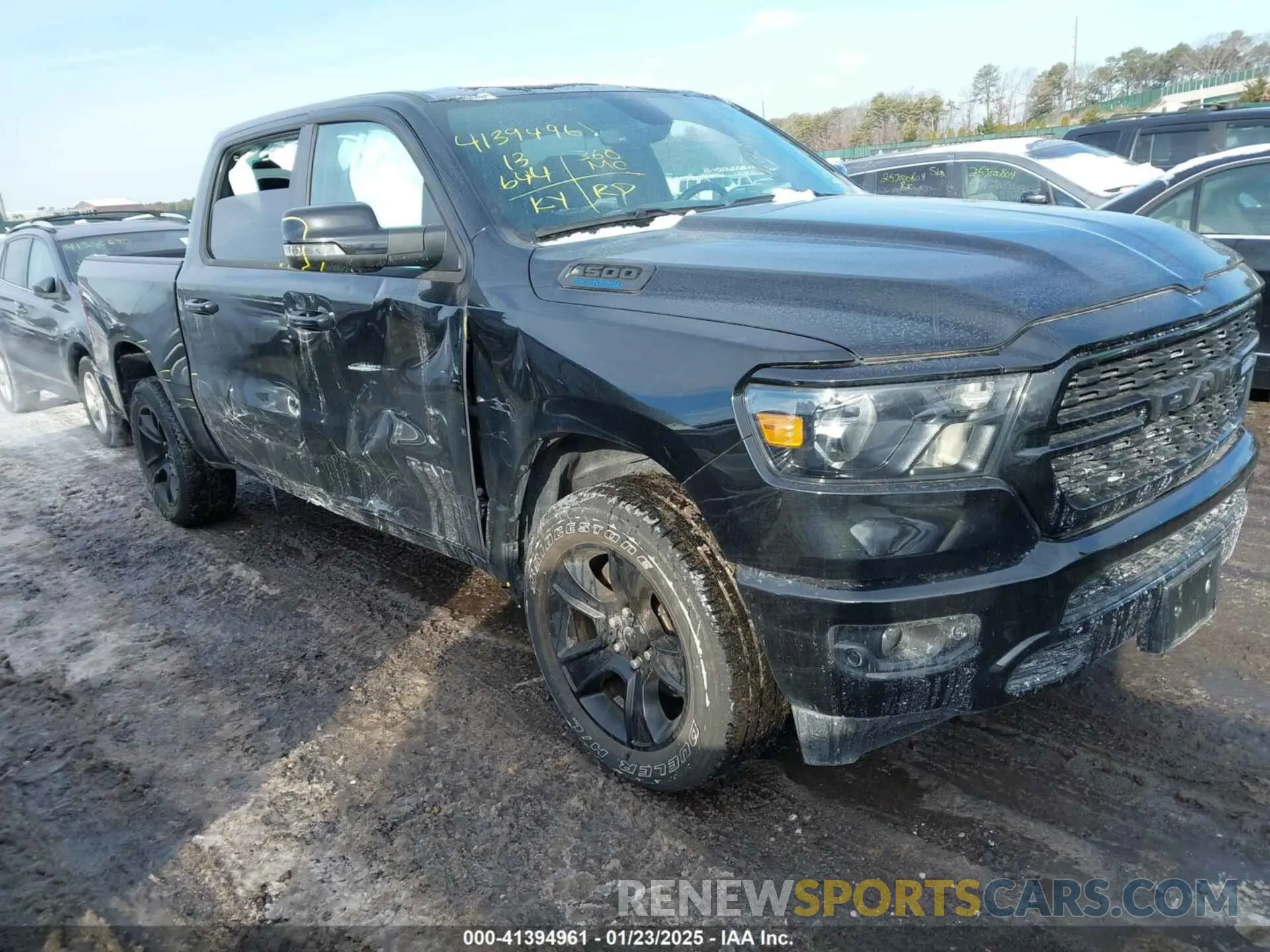1 Photograph of a damaged car 1C6RRFFG3PN679383 RAM 1500 2023