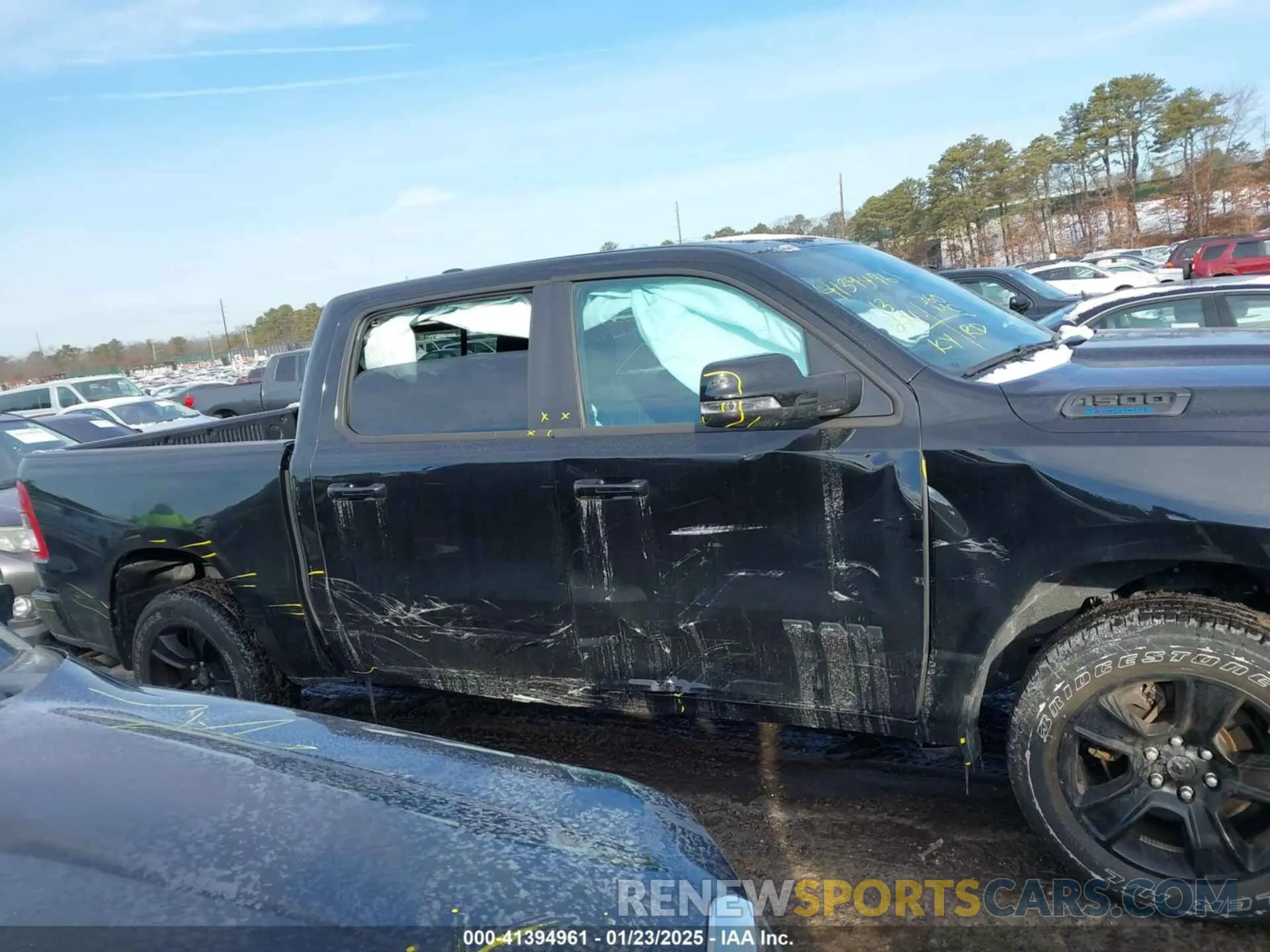 13 Photograph of a damaged car 1C6RRFFG3PN679383 RAM 1500 2023