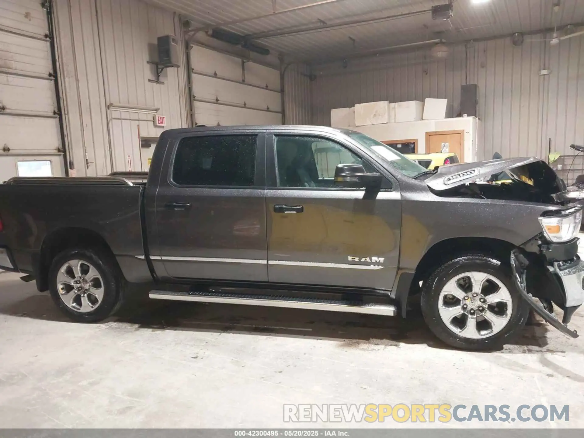 13 Photograph of a damaged car 1C6RRFFG4PN667047 RAM 1500 2023