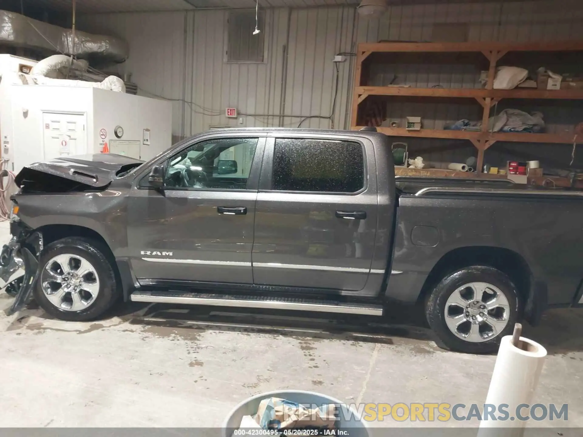 14 Photograph of a damaged car 1C6RRFFG4PN667047 RAM 1500 2023