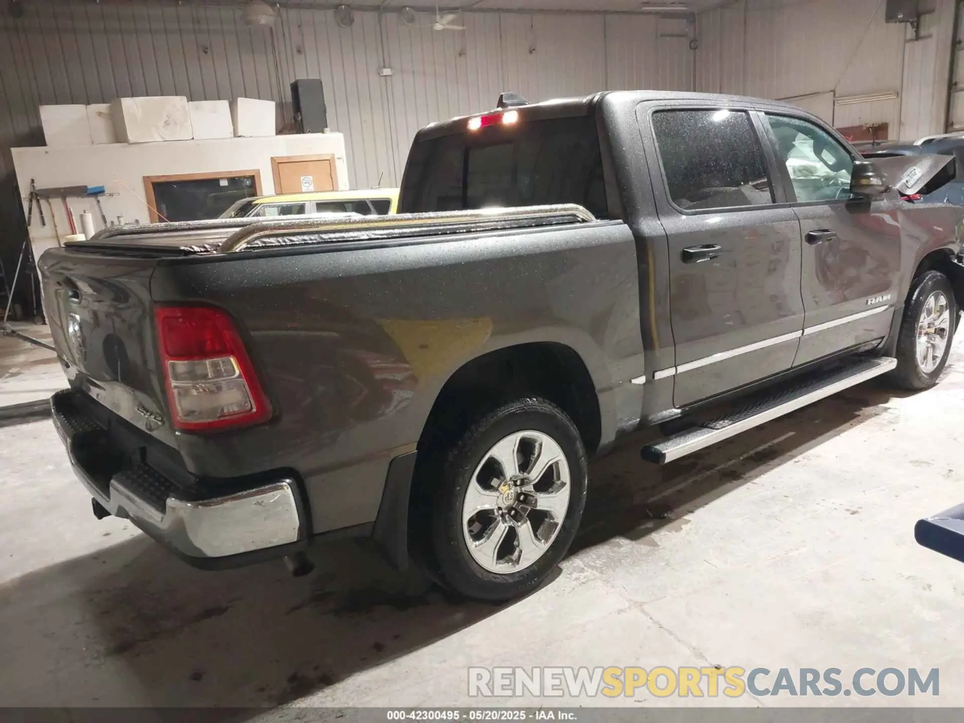 4 Photograph of a damaged car 1C6RRFFG4PN667047 RAM 1500 2023