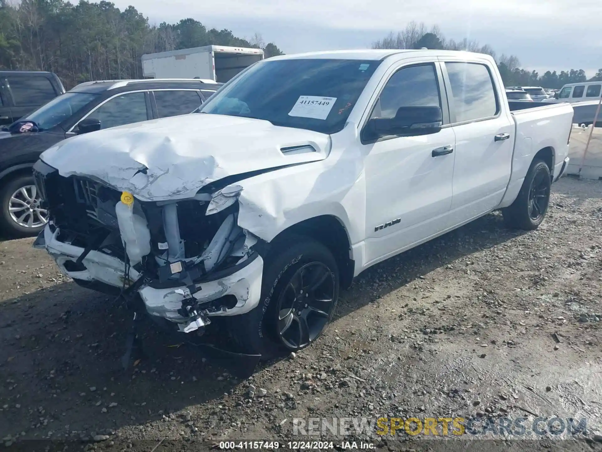 2 Photograph of a damaged car 1C6RRFFG5PN564025 RAM 1500 2023