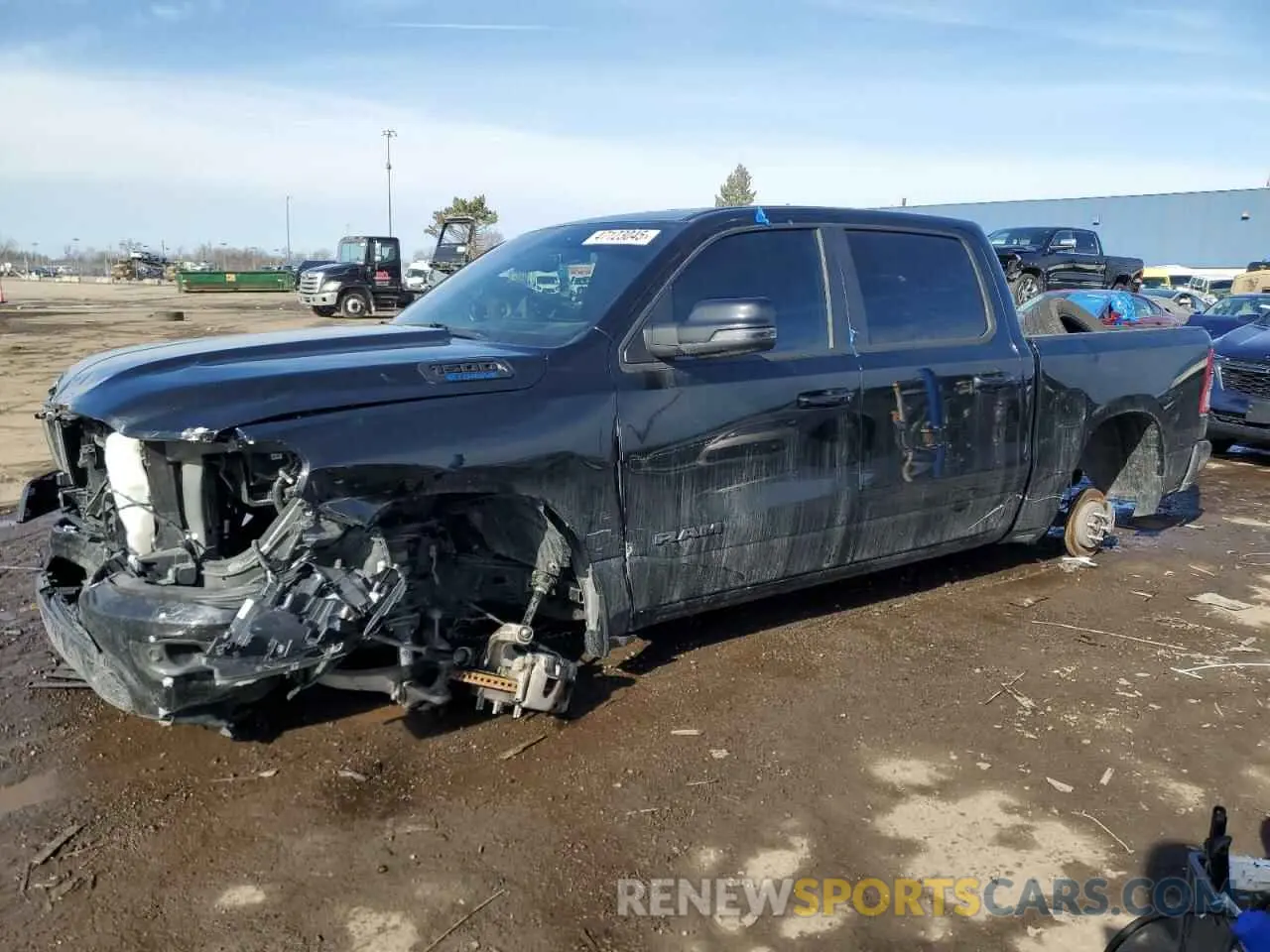 1 Photograph of a damaged car 1C6RRFFG5PN577938 RAM 1500 2023