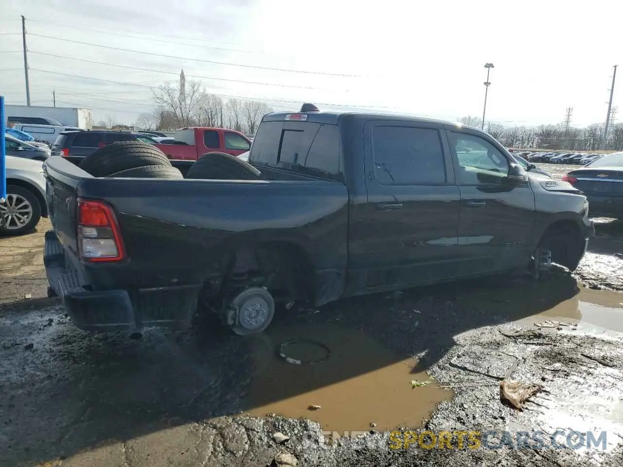 3 Photograph of a damaged car 1C6RRFFG5PN577938 RAM 1500 2023