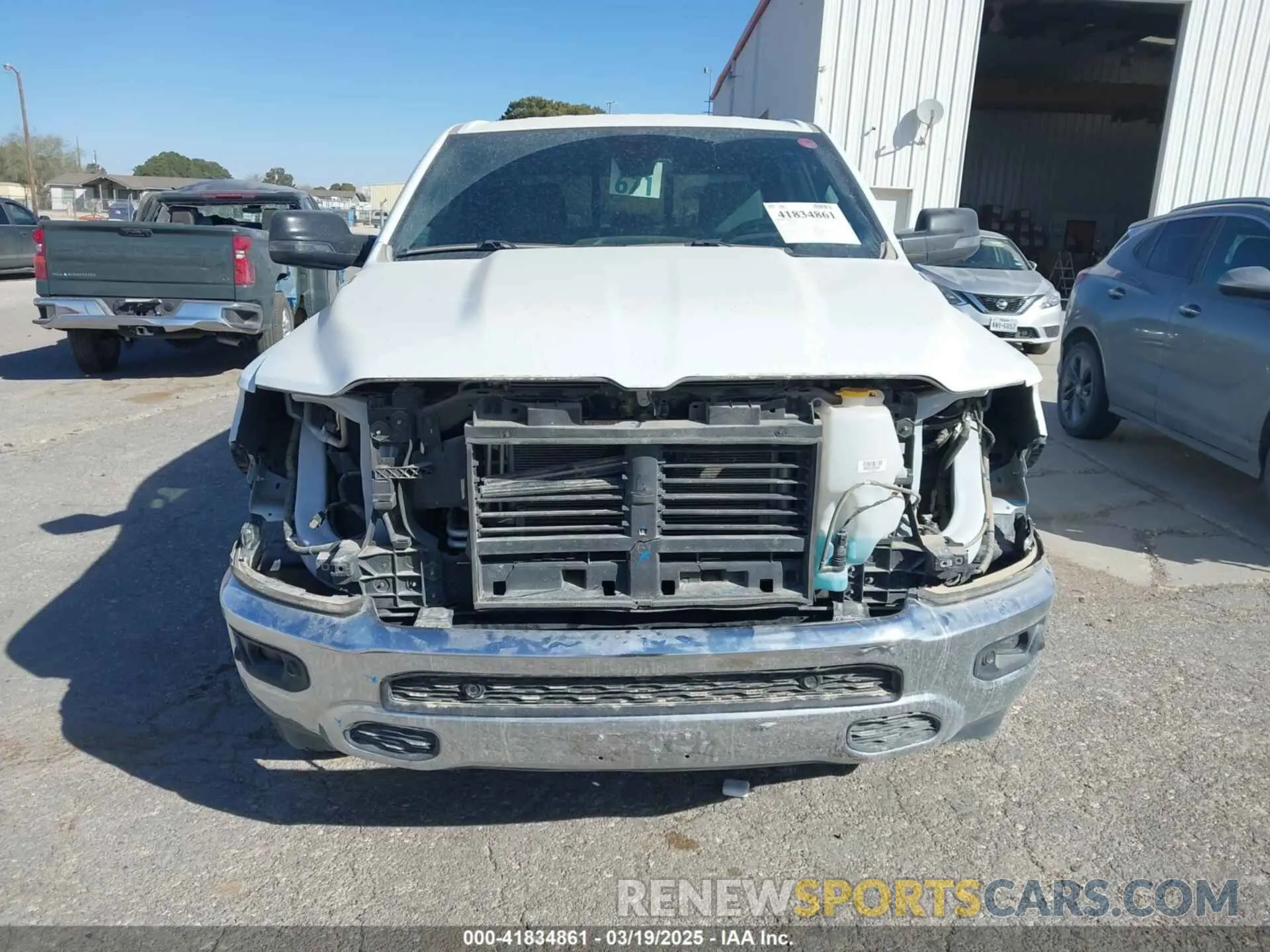12 Photograph of a damaged car 1C6RRFFG5PN694533 RAM 1500 2023