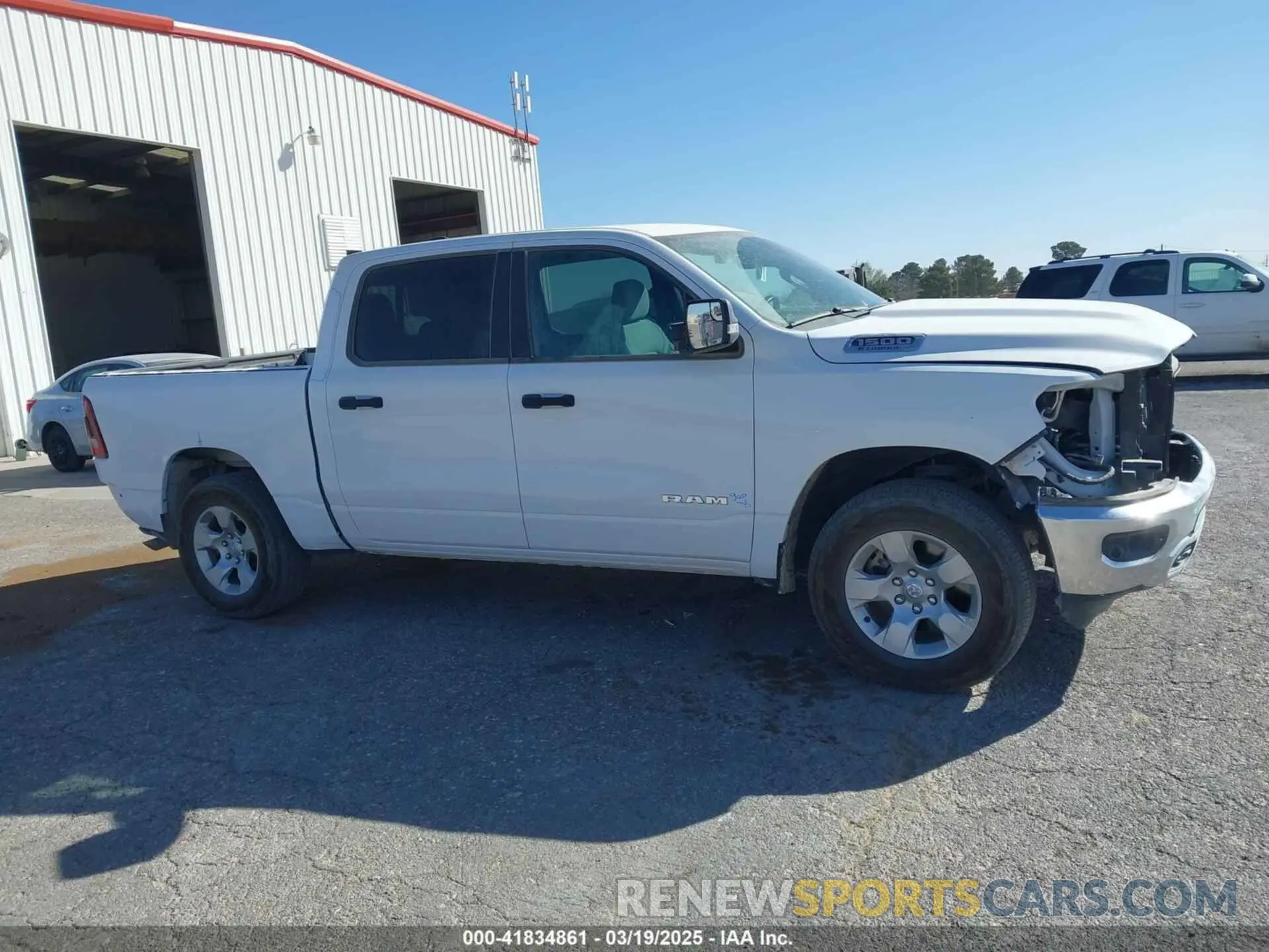 13 Photograph of a damaged car 1C6RRFFG5PN694533 RAM 1500 2023