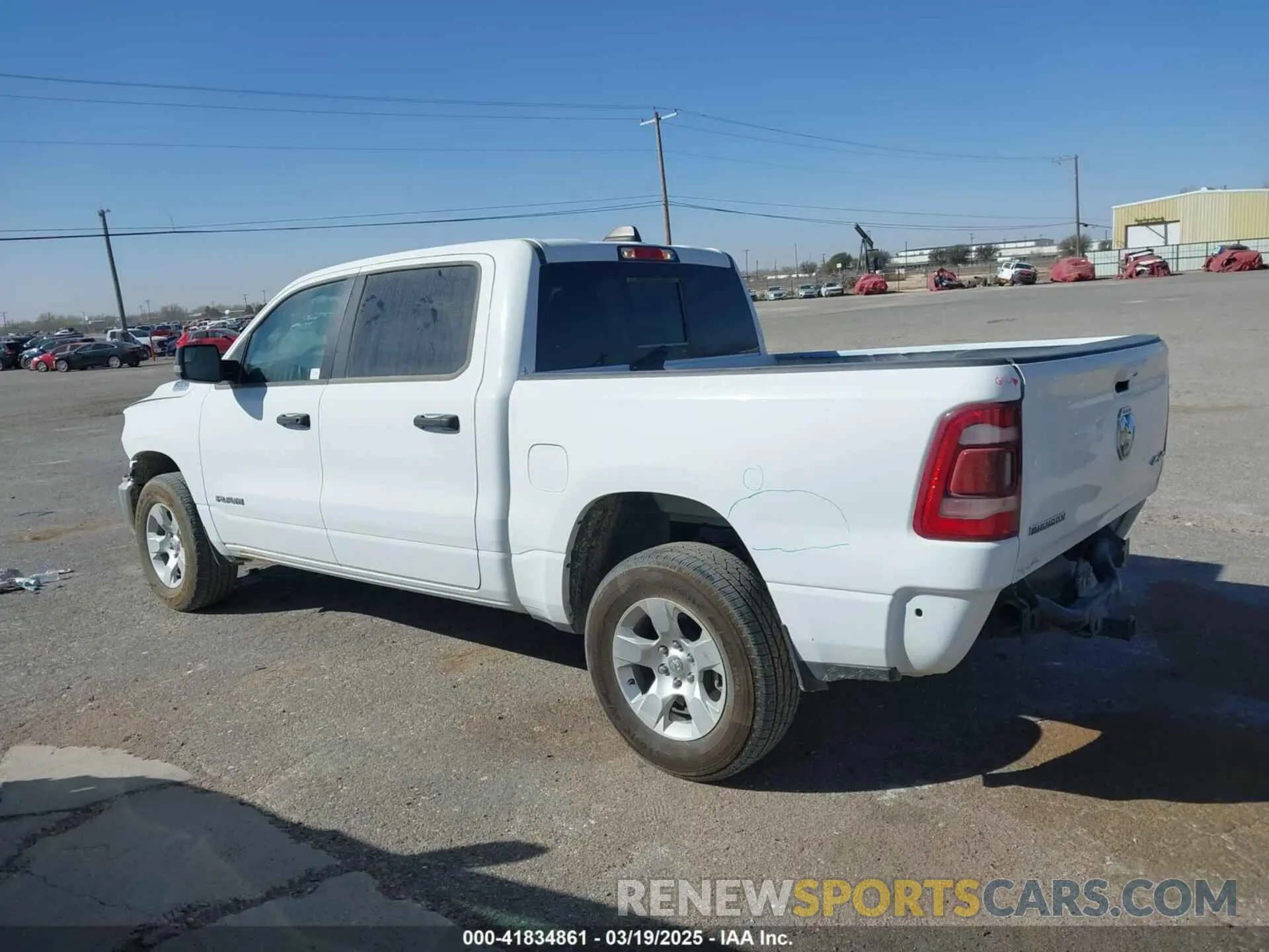 14 Photograph of a damaged car 1C6RRFFG5PN694533 RAM 1500 2023