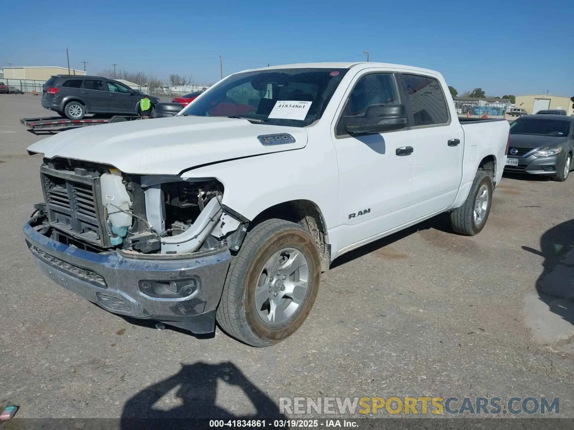 2 Photograph of a damaged car 1C6RRFFG5PN694533 RAM 1500 2023
