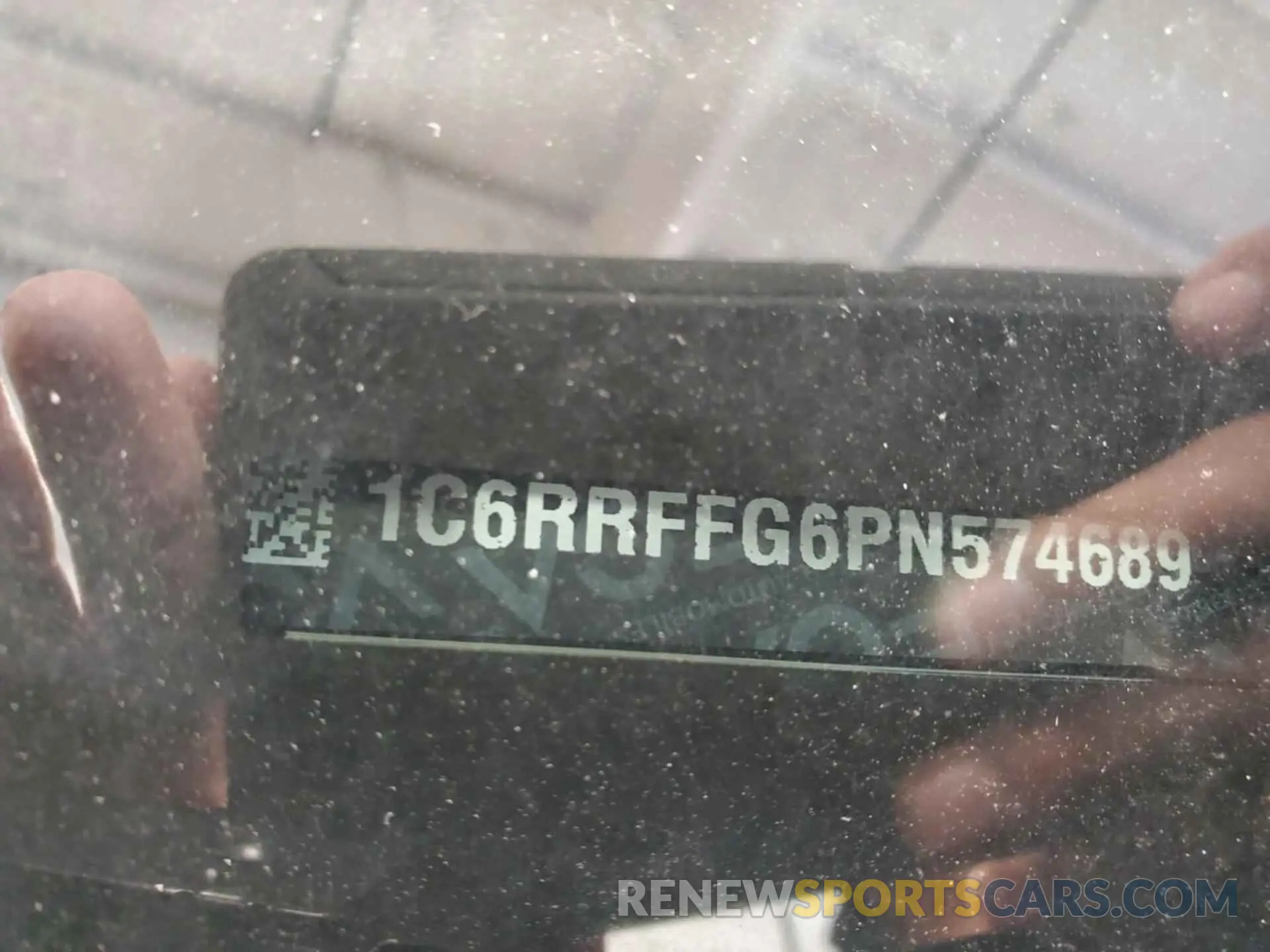 10 Photograph of a damaged car 1C6RRFFG6PN574689 RAM 1500 2023