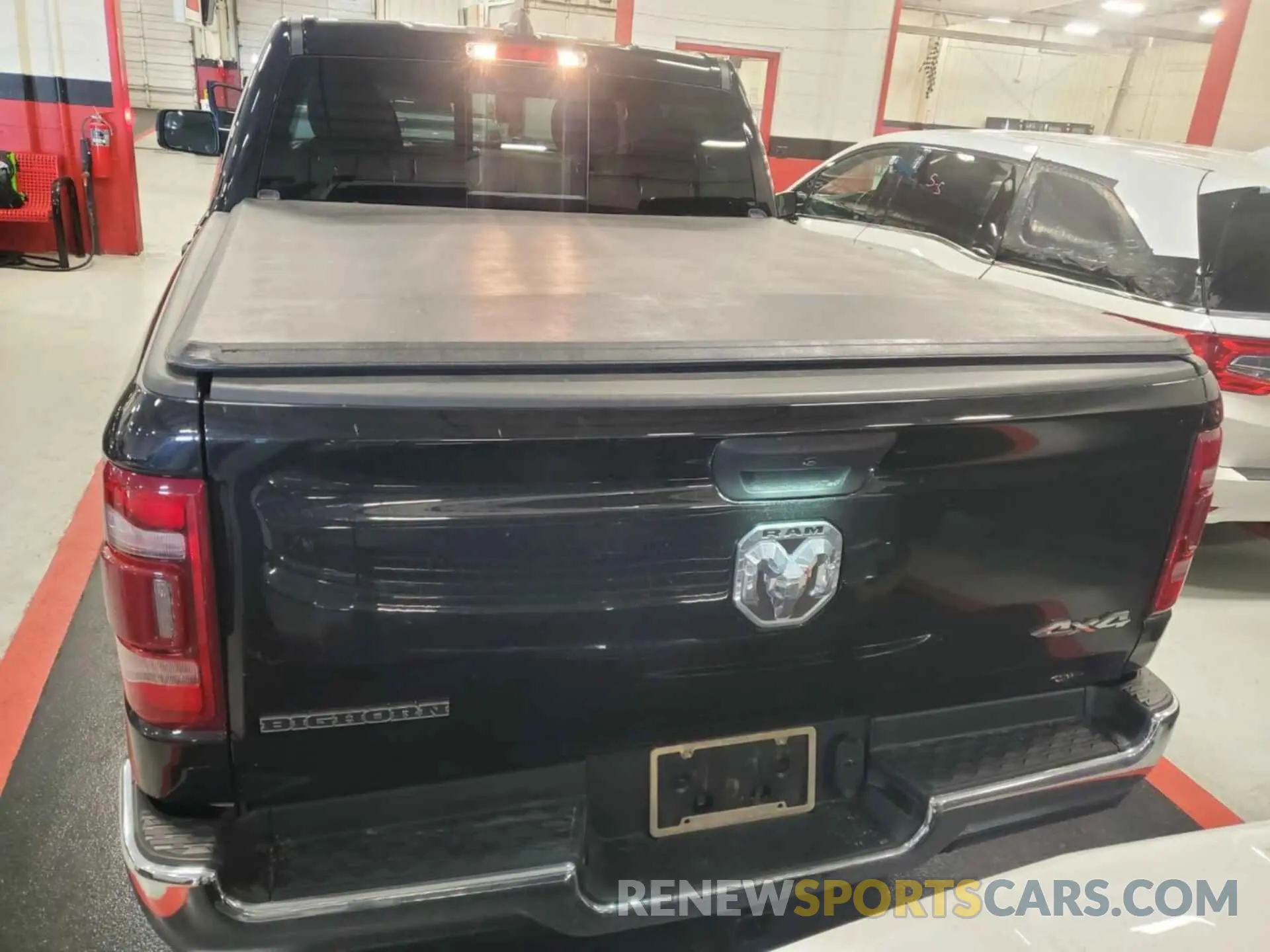 11 Photograph of a damaged car 1C6RRFFG6PN574689 RAM 1500 2023