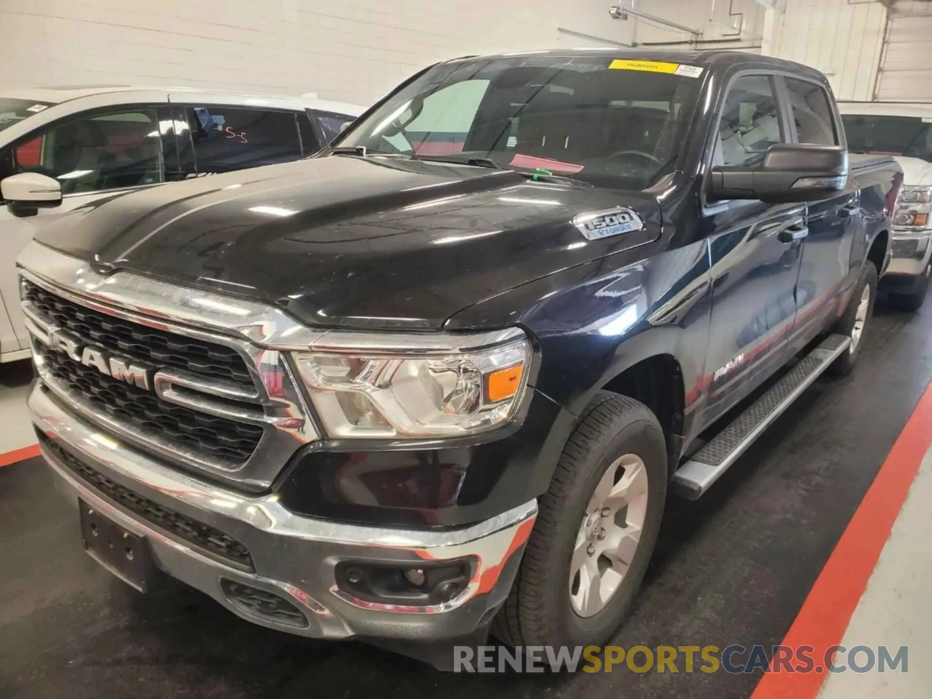 12 Photograph of a damaged car 1C6RRFFG6PN574689 RAM 1500 2023