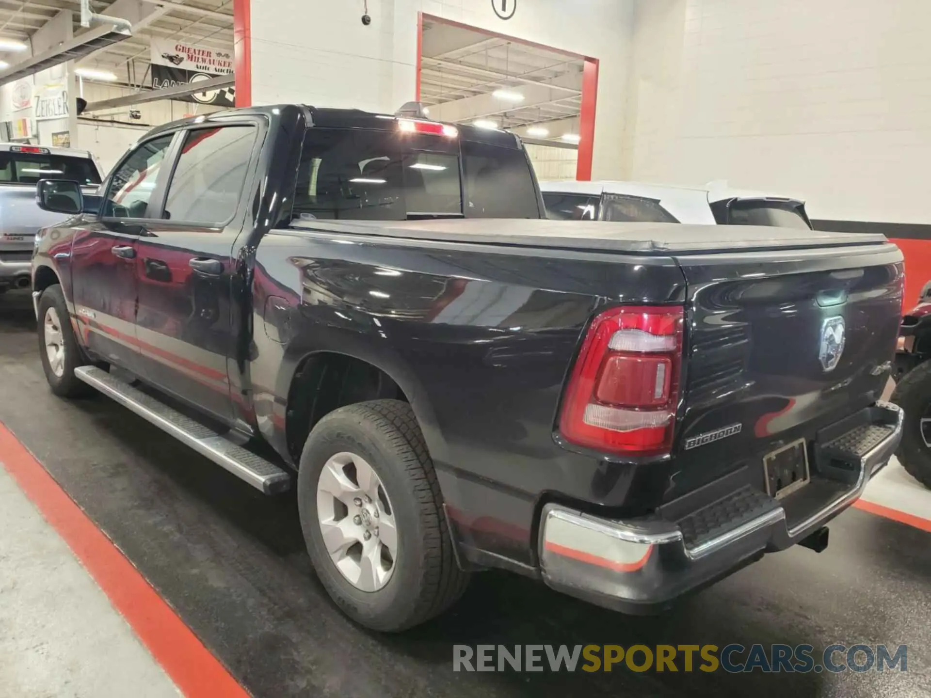 7 Photograph of a damaged car 1C6RRFFG6PN574689 RAM 1500 2023