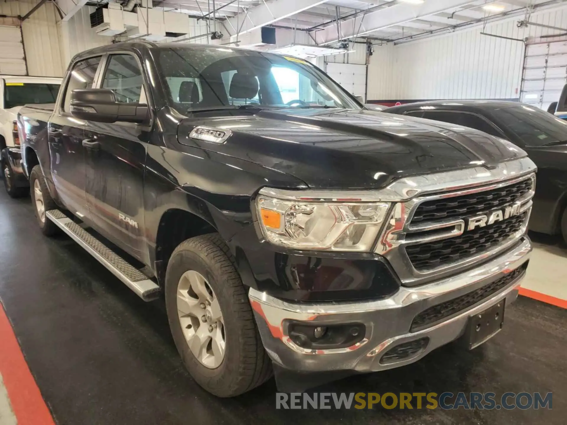 9 Photograph of a damaged car 1C6RRFFG6PN574689 RAM 1500 2023