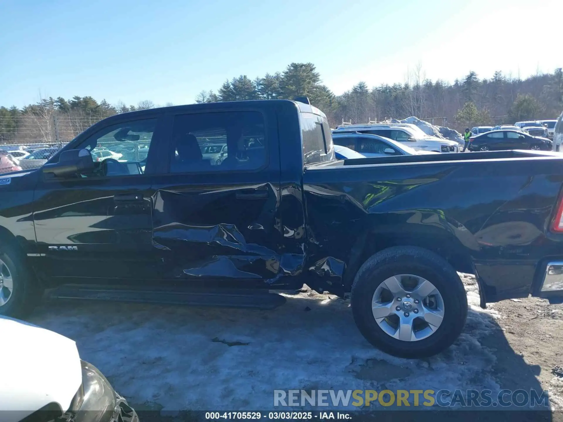 14 Photograph of a damaged car 1C6RRFFG6PN613653 RAM 1500 2023