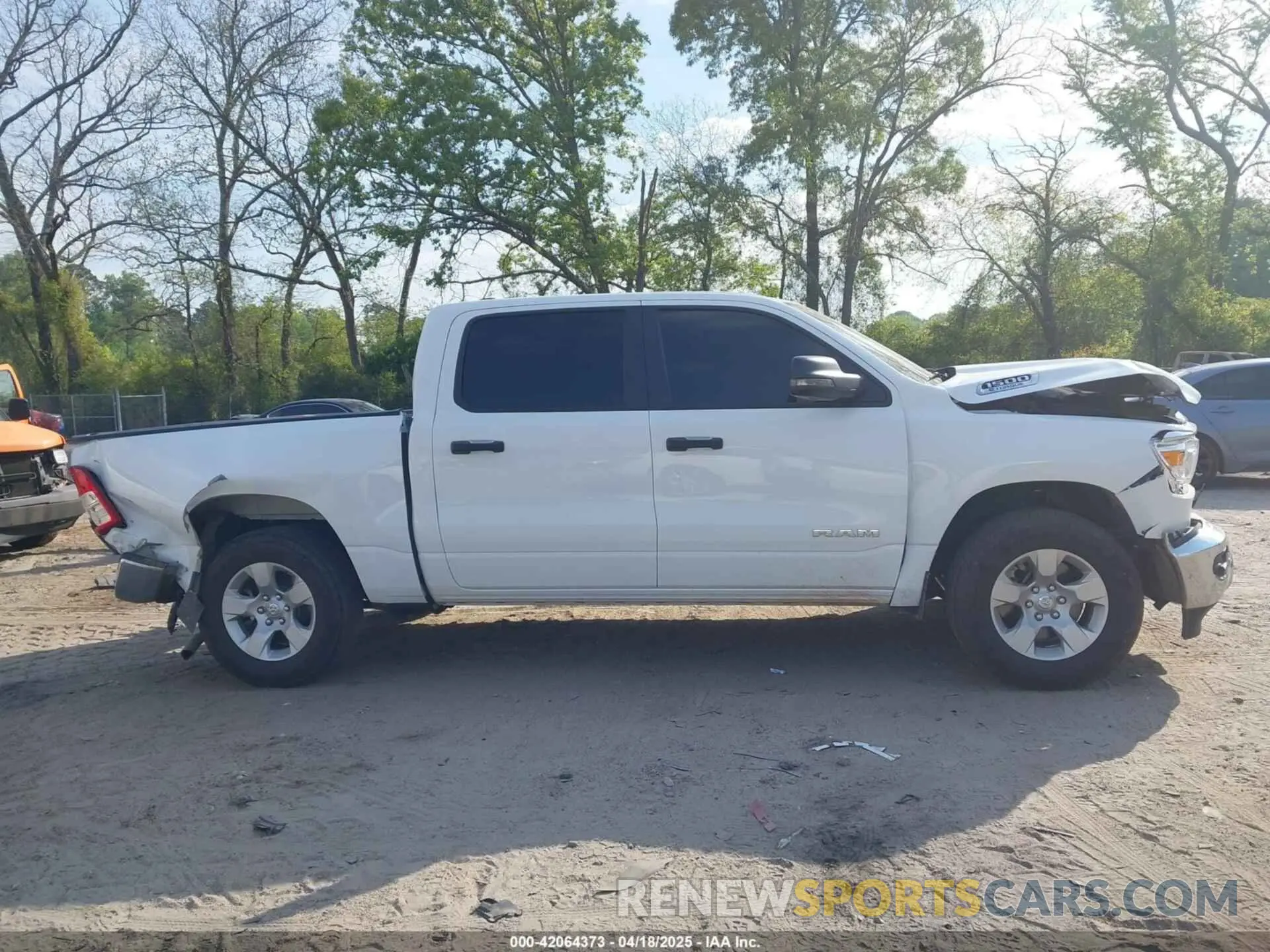 13 Photograph of a damaged car 1C6RRFFG6PN694458 RAM 1500 2023