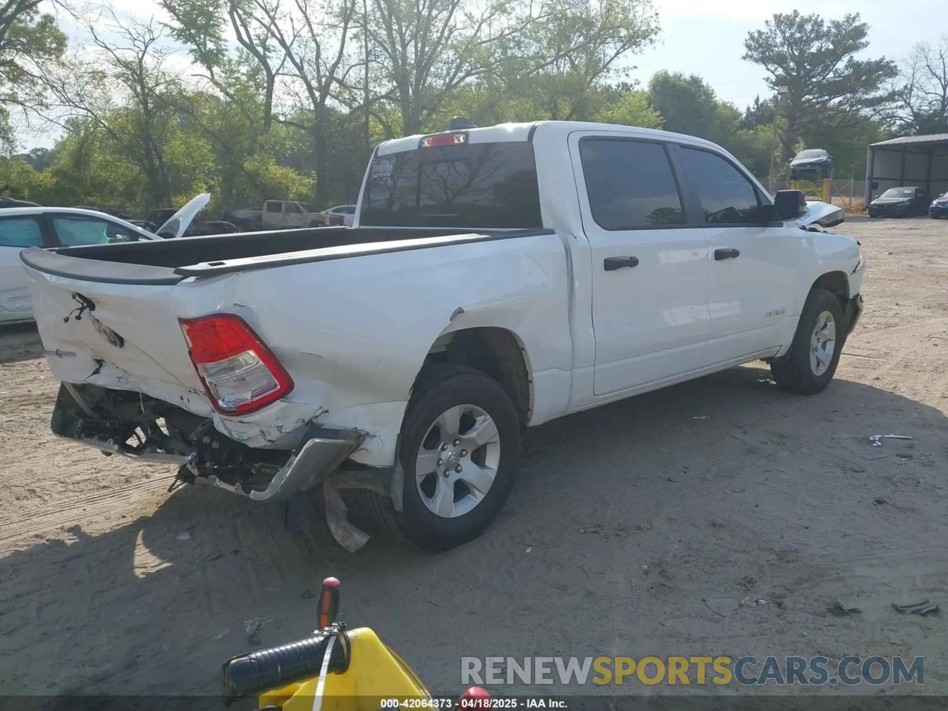 4 Photograph of a damaged car 1C6RRFFG6PN694458 RAM 1500 2023
