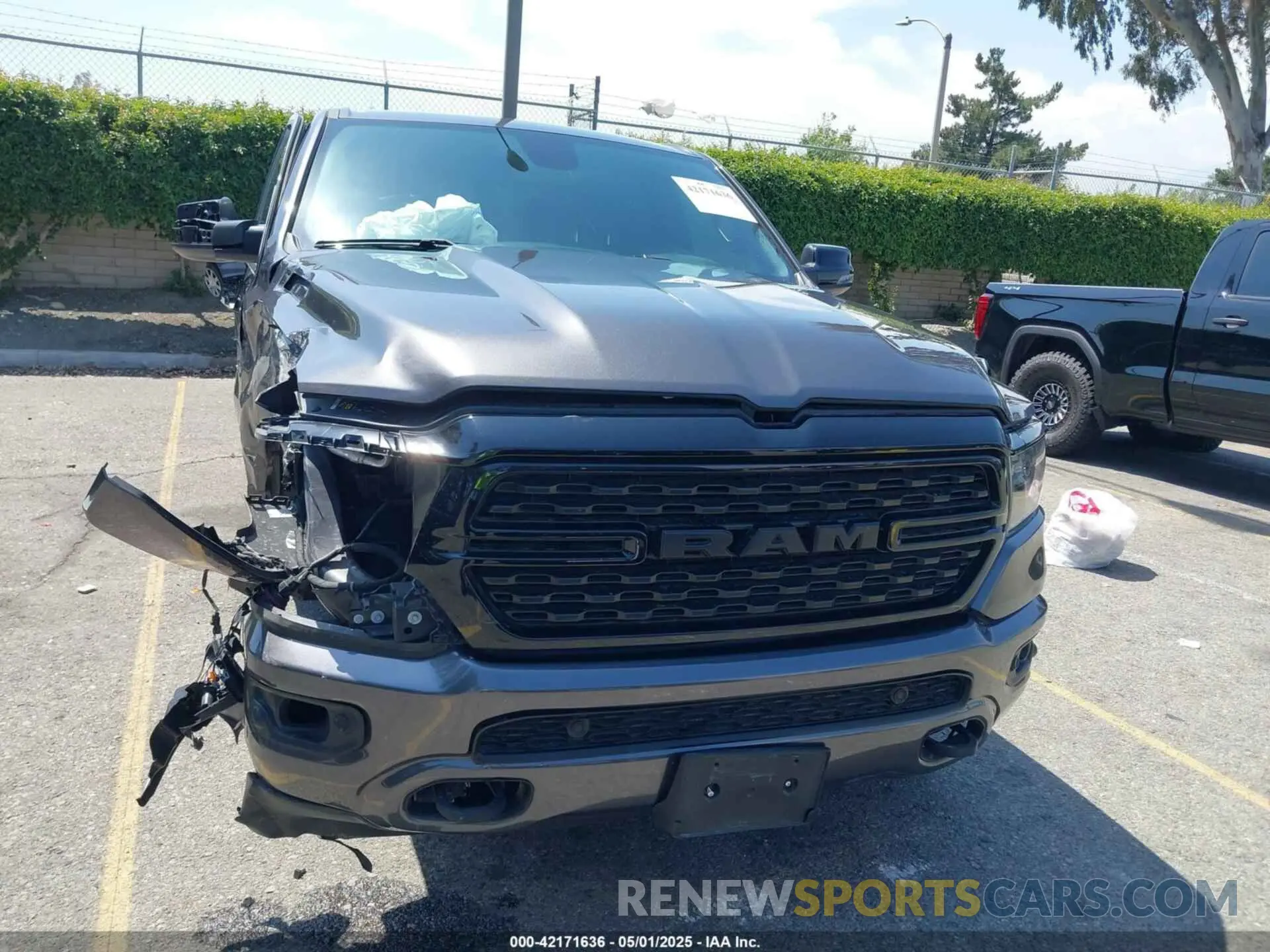 13 Photograph of a damaged car 1C6RRFFG7PN635841 RAM 1500 2023