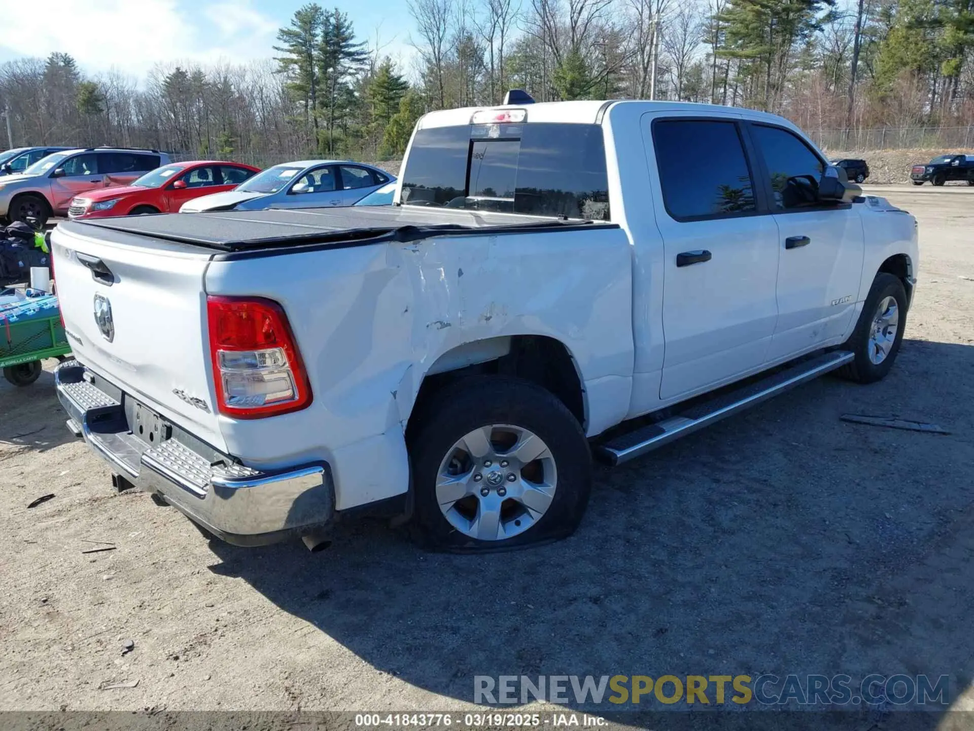 4 Photograph of a damaged car 1C6RRFFG8PN649148 RAM 1500 2023