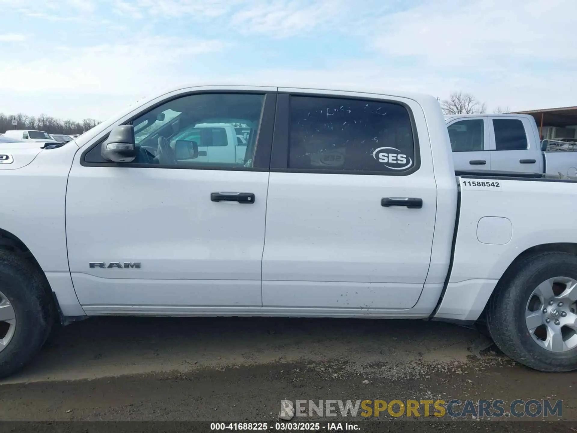 14 Photograph of a damaged car 1C6RRFFG9PN517256 RAM 1500 2023
