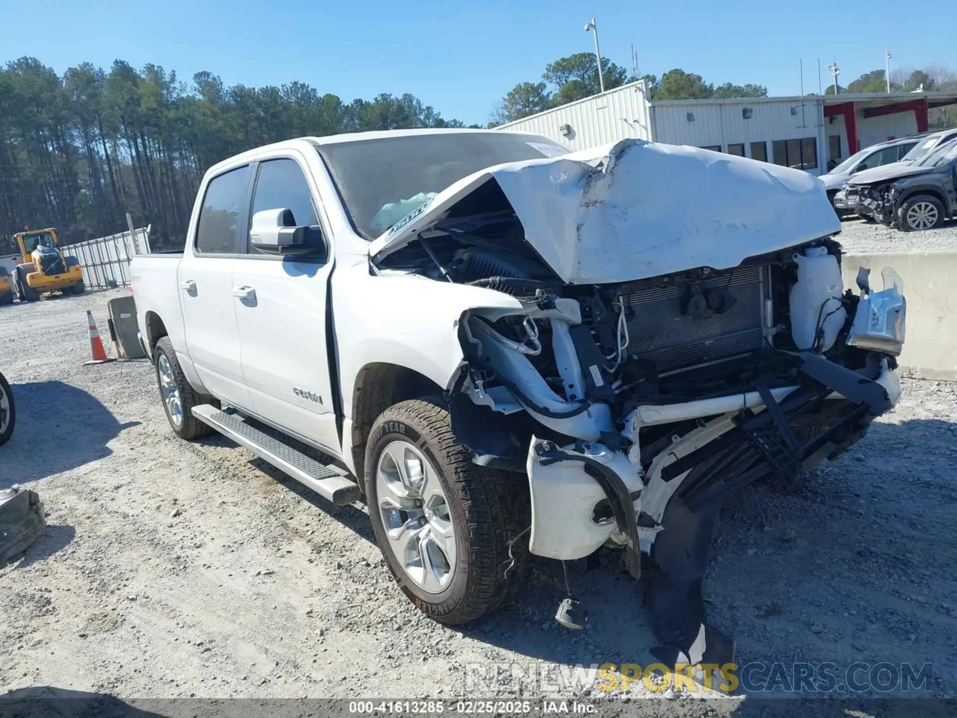 1 Photograph of a damaged car 1C6RRFFGXPN520294 RAM 1500 2023