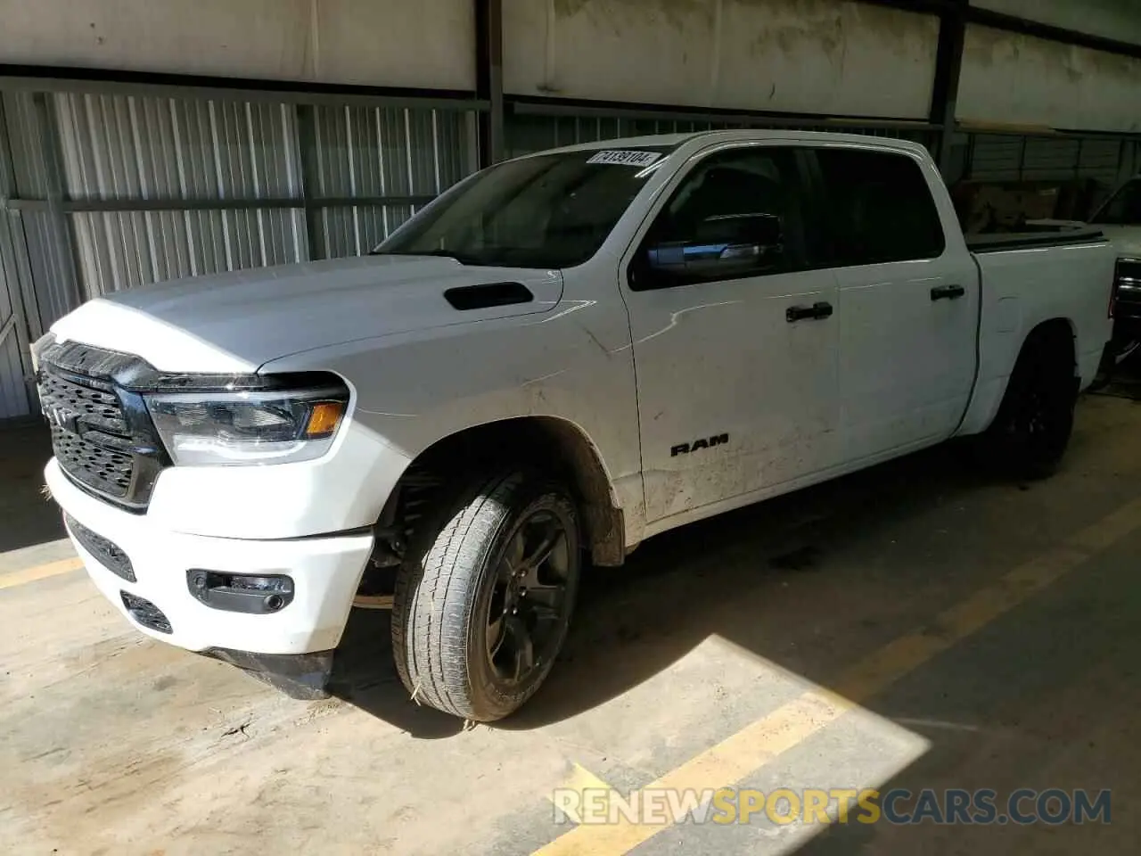 1 Photograph of a damaged car 1C6RRFFGXPN666856 RAM 1500 2023