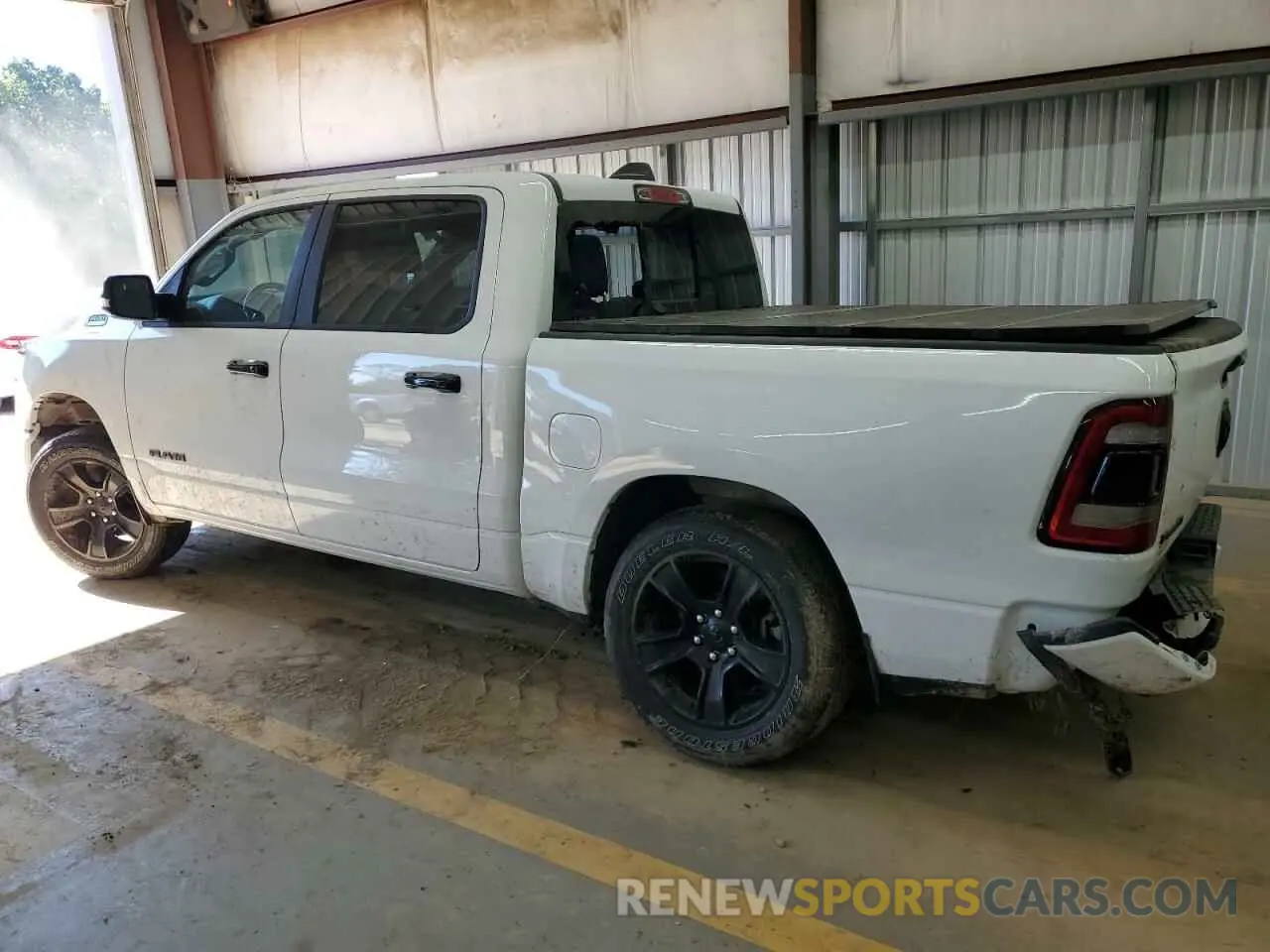 2 Photograph of a damaged car 1C6RRFFGXPN666856 RAM 1500 2023