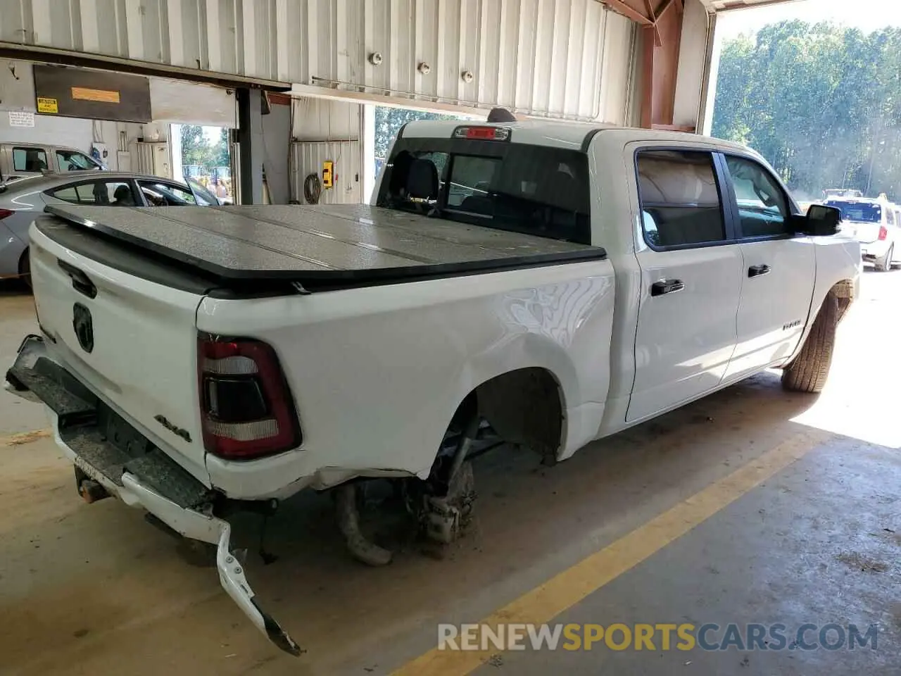 3 Photograph of a damaged car 1C6RRFFGXPN666856 RAM 1500 2023