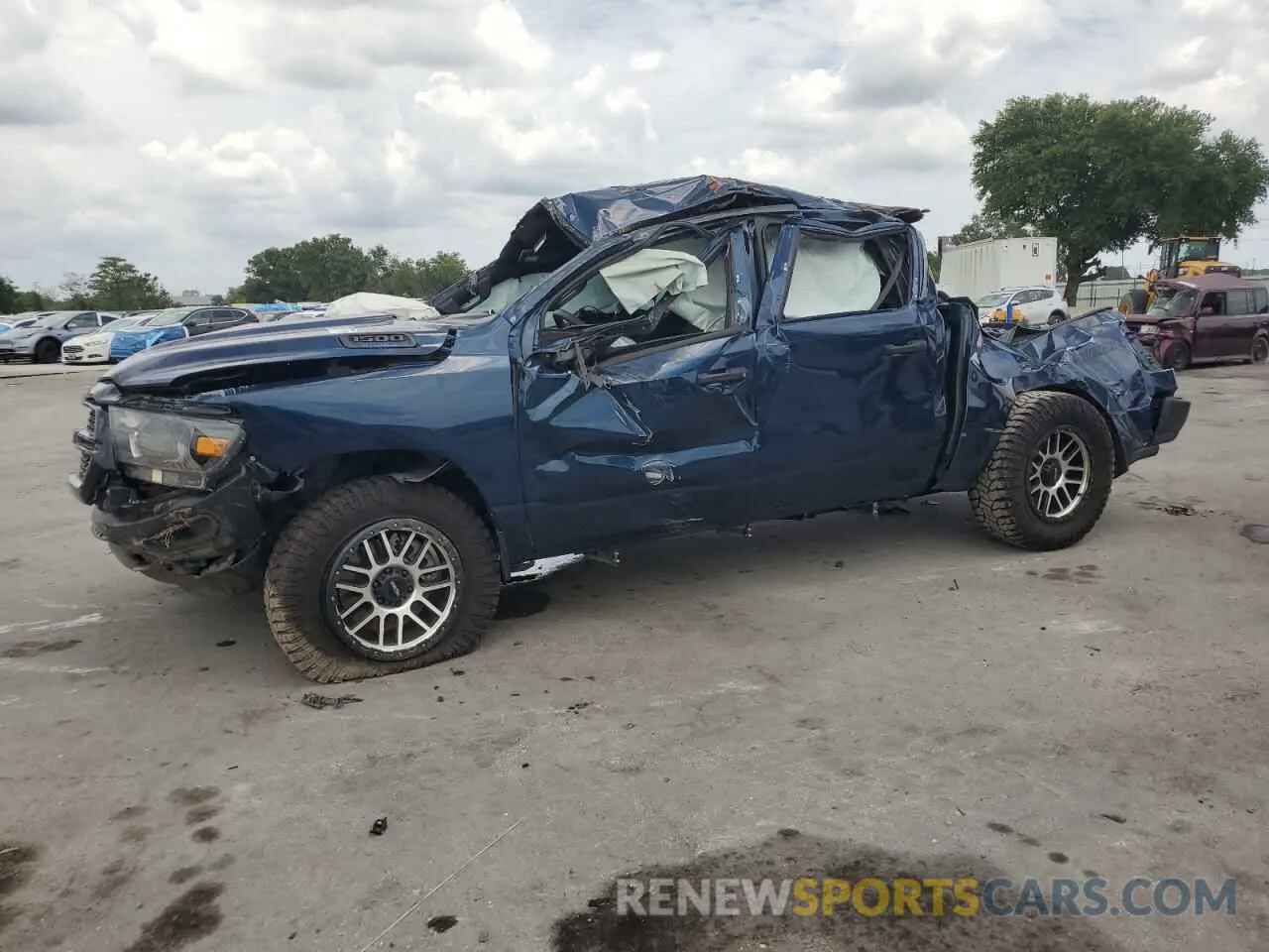 1 Photograph of a damaged car 1C6RRFGG0PN683910 RAM 1500 2023