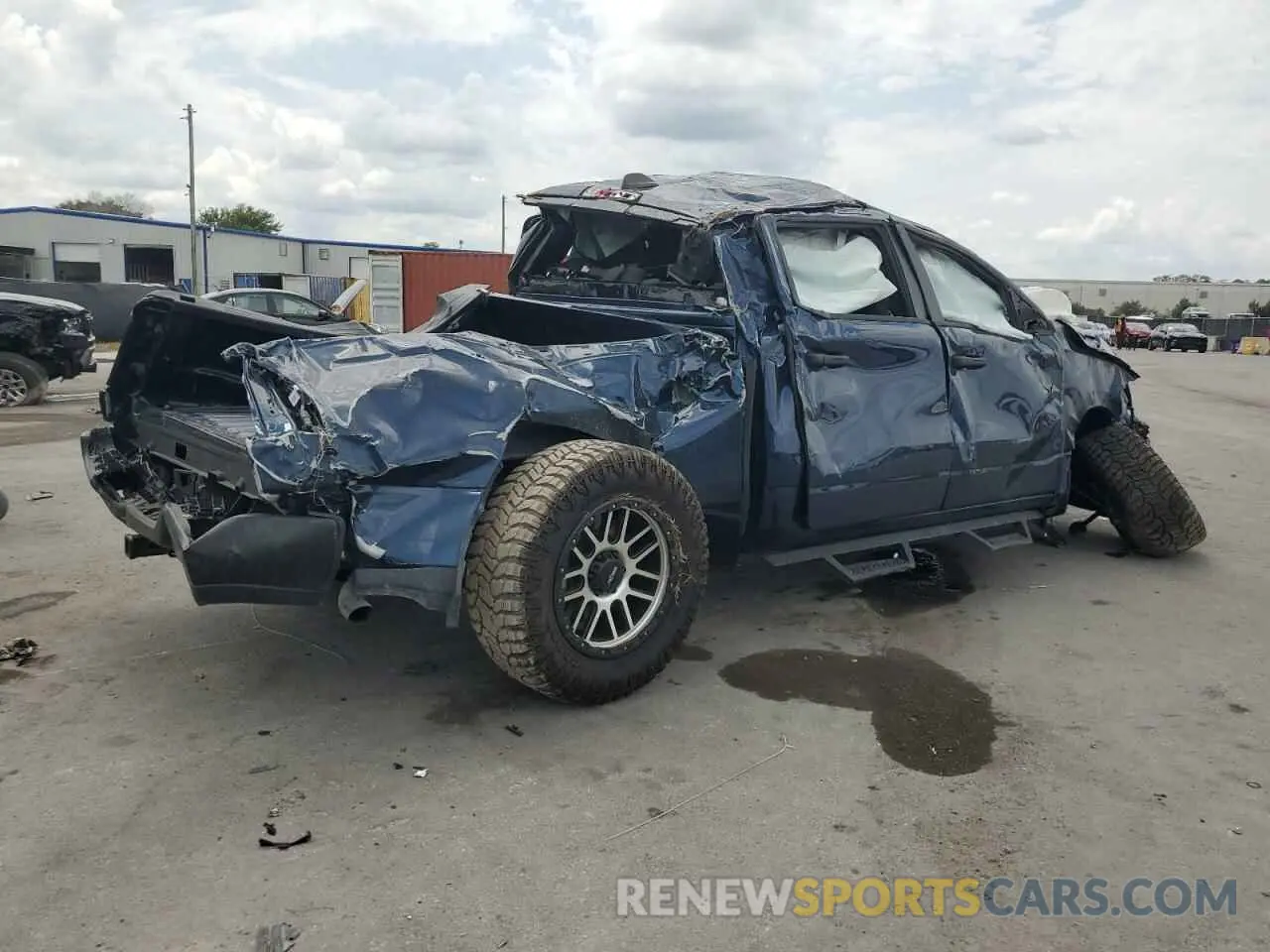 3 Photograph of a damaged car 1C6RRFGG0PN683910 RAM 1500 2023