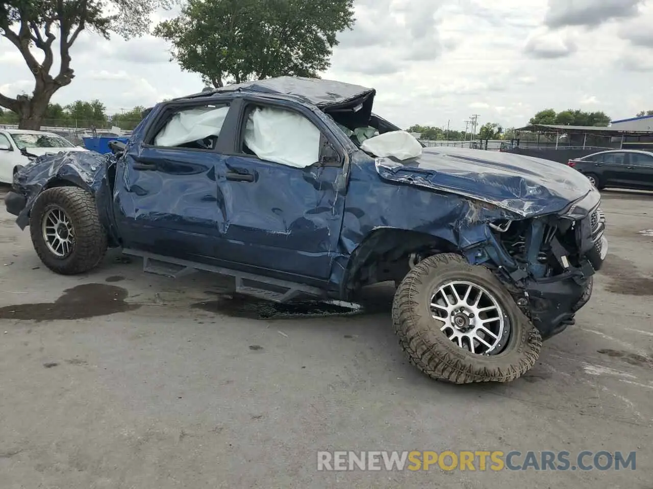 4 Photograph of a damaged car 1C6RRFGG0PN683910 RAM 1500 2023