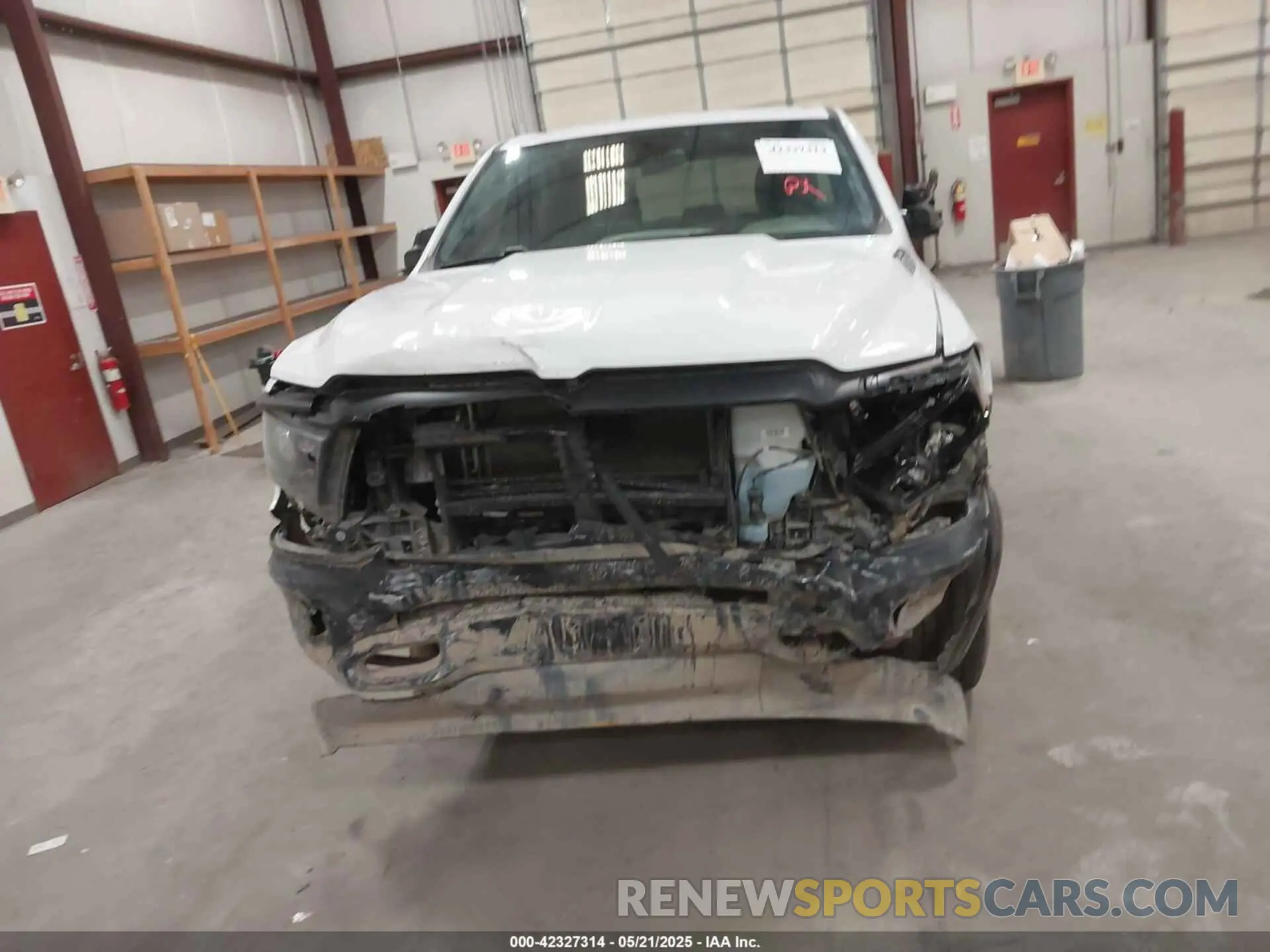 12 Photograph of a damaged car 1C6RRFGG1PN641214 RAM 1500 2023