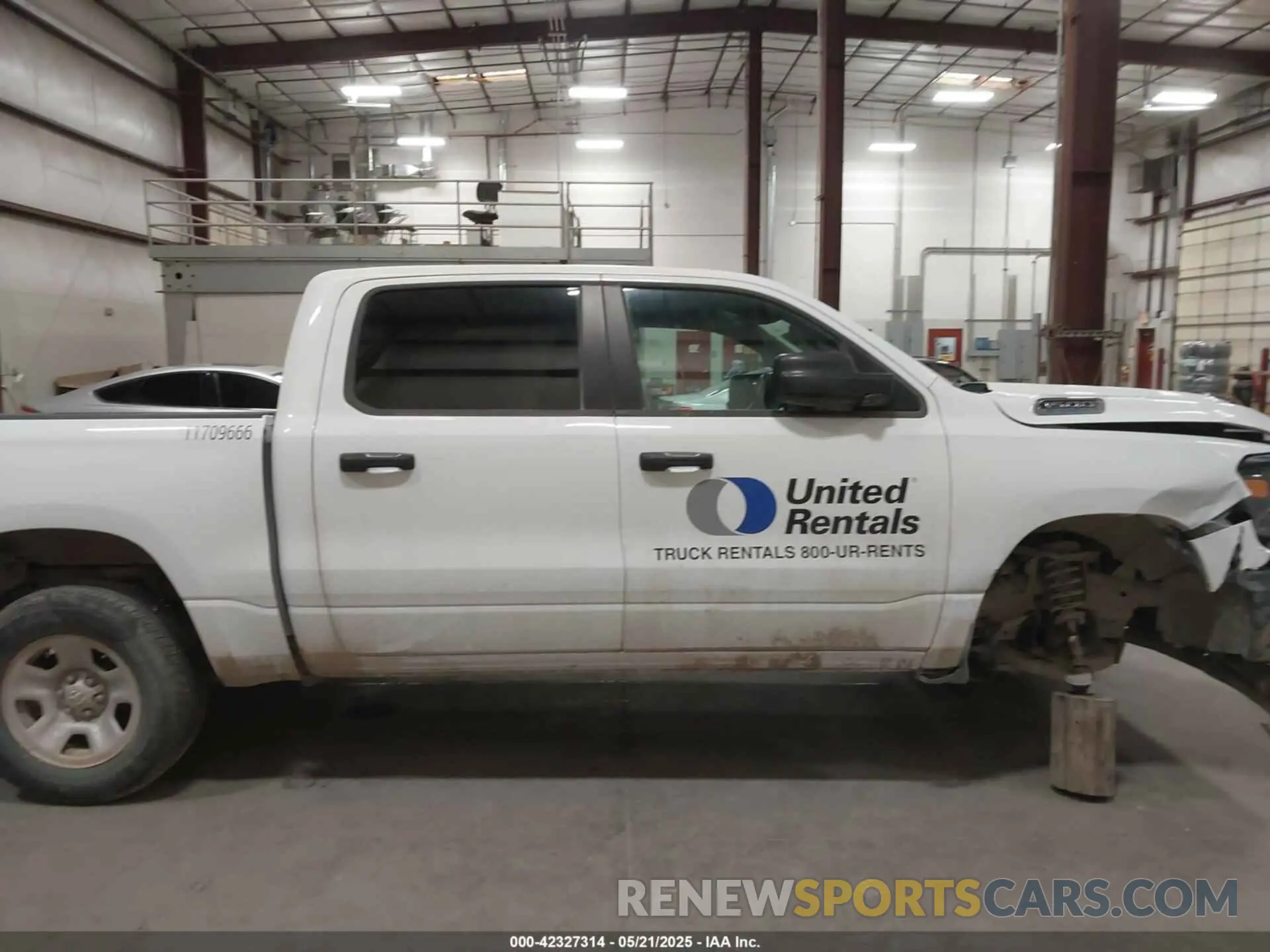 13 Photograph of a damaged car 1C6RRFGG1PN641214 RAM 1500 2023
