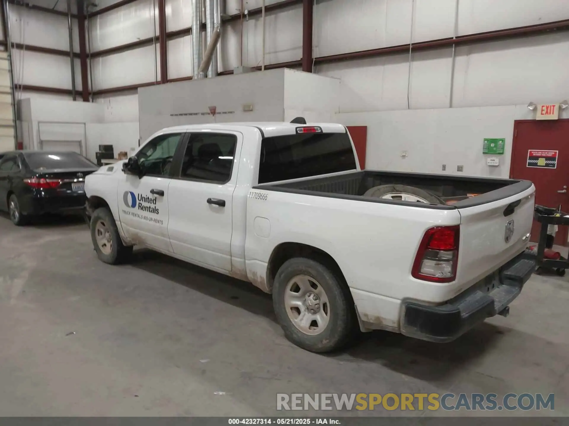 3 Photograph of a damaged car 1C6RRFGG1PN641214 RAM 1500 2023