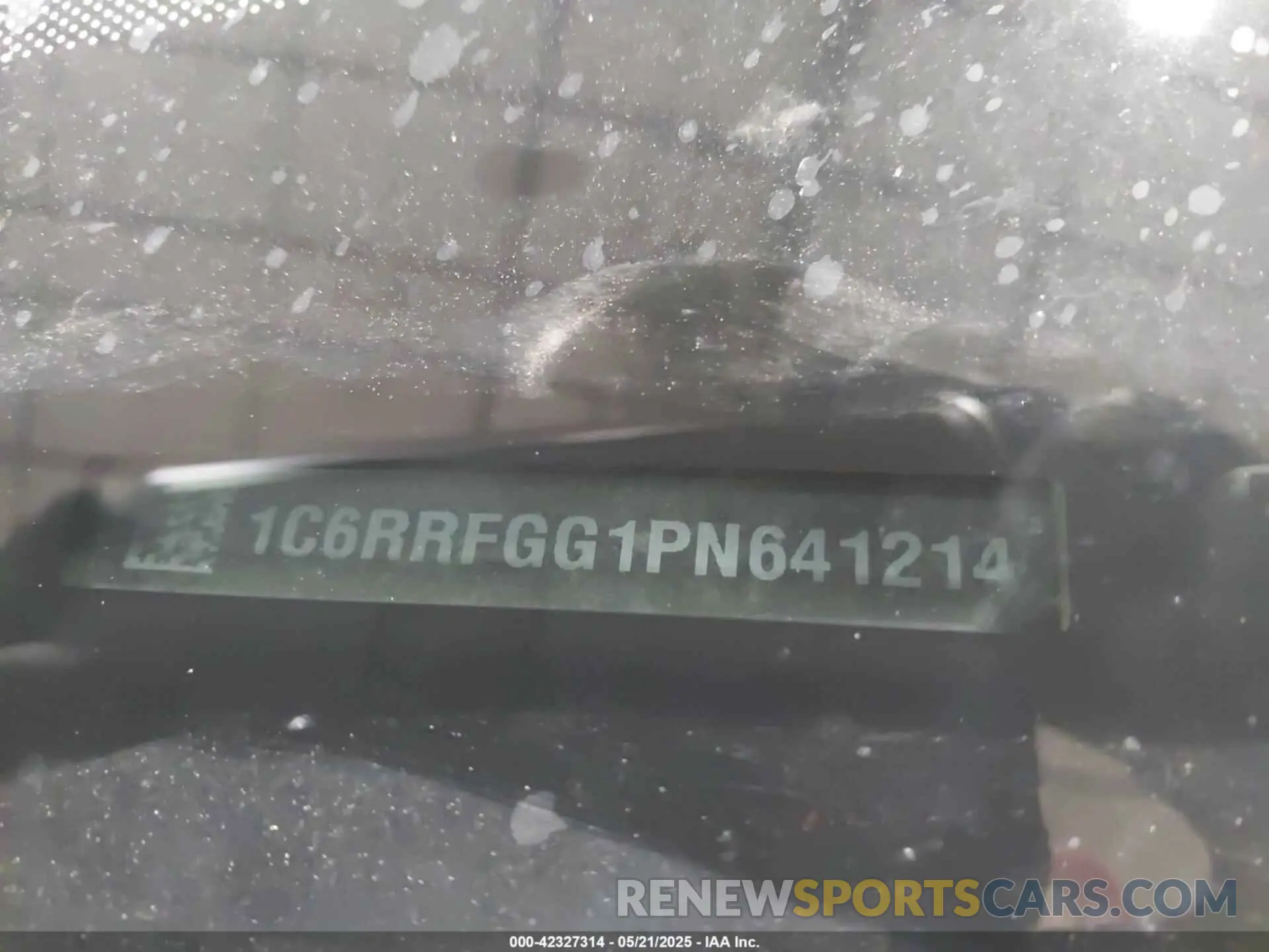 9 Photograph of a damaged car 1C6RRFGG1PN641214 RAM 1500 2023