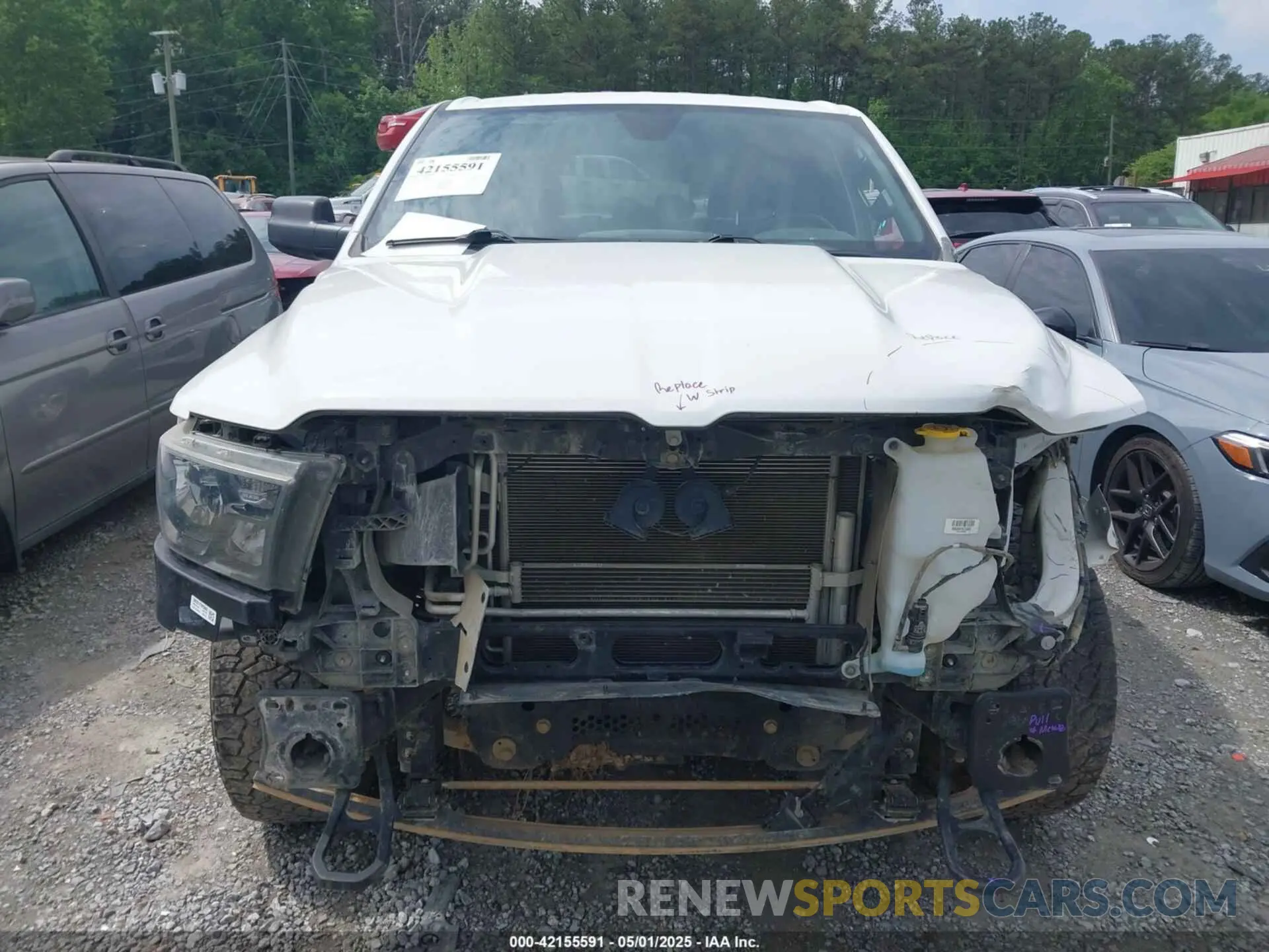 13 Photograph of a damaged car 1C6RRFGG4PN641188 RAM 1500 2023