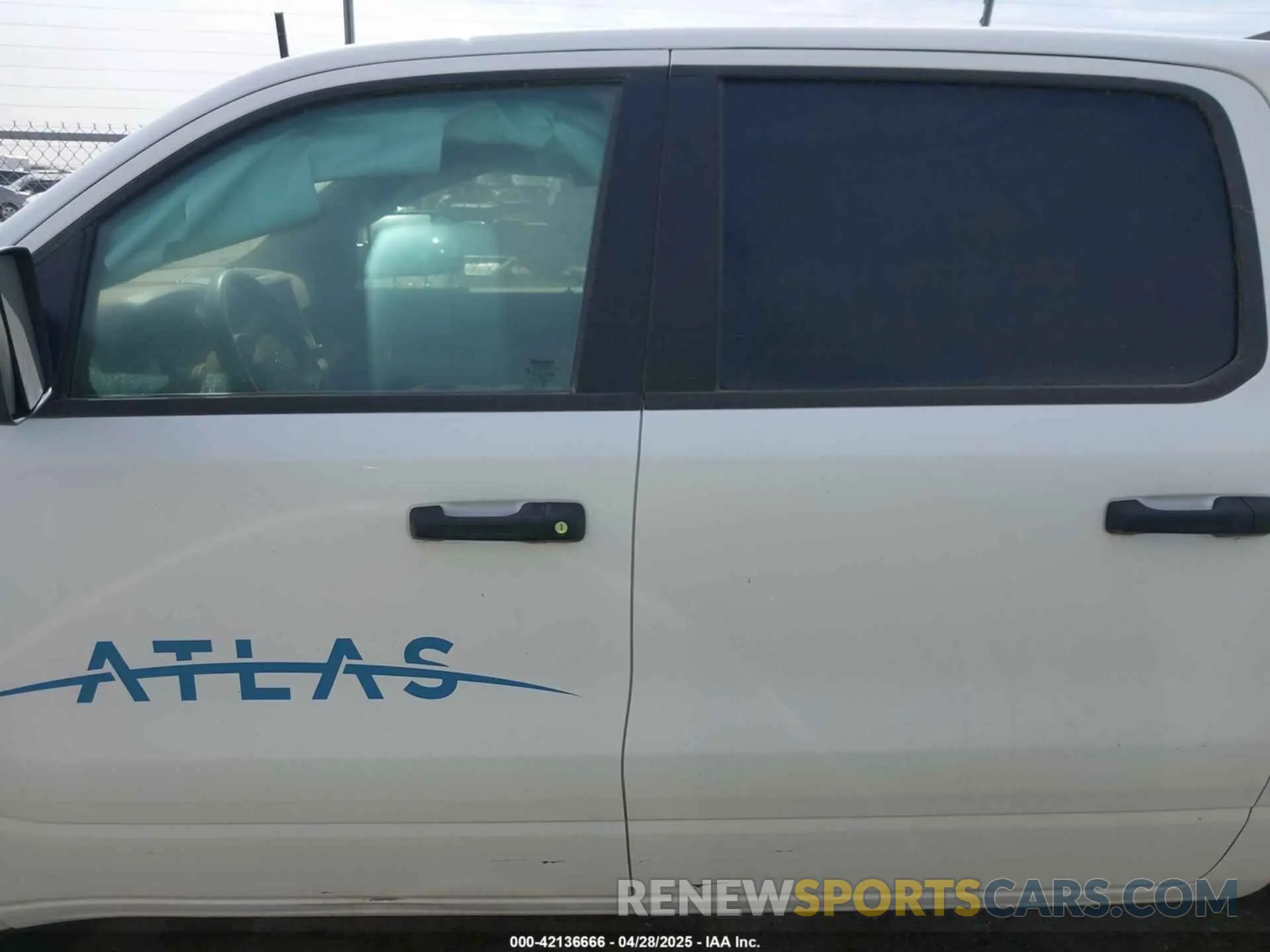 14 Photograph of a damaged car 1C6RRFGGXPN600516 RAM 1500 2023