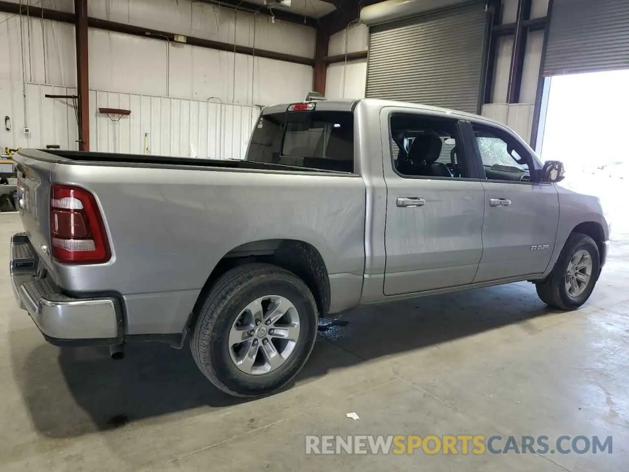 3 Photograph of a damaged car 1C6RRFJG0PN614983 RAM 1500 2023