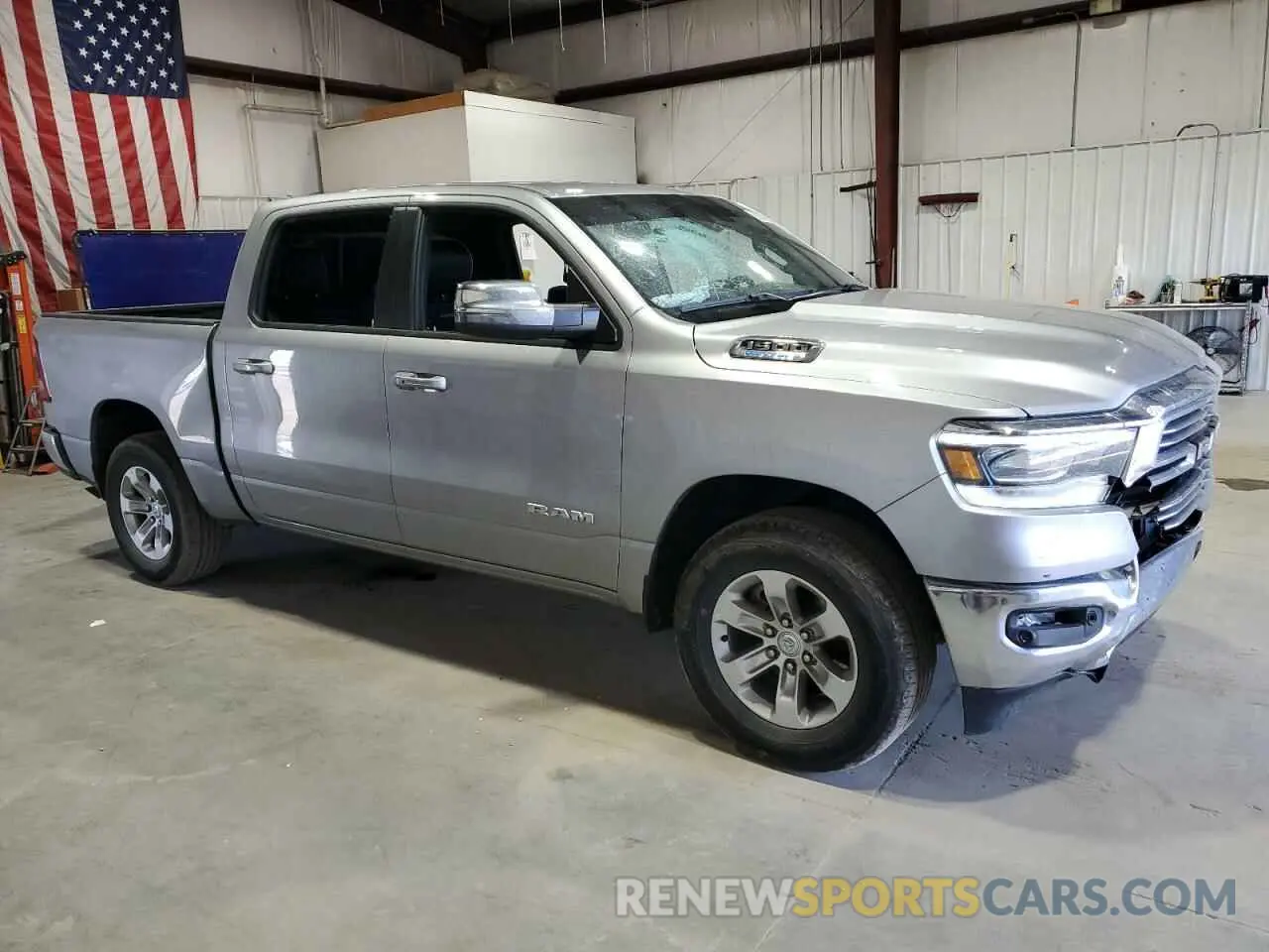 4 Photograph of a damaged car 1C6RRFJG0PN614983 RAM 1500 2023