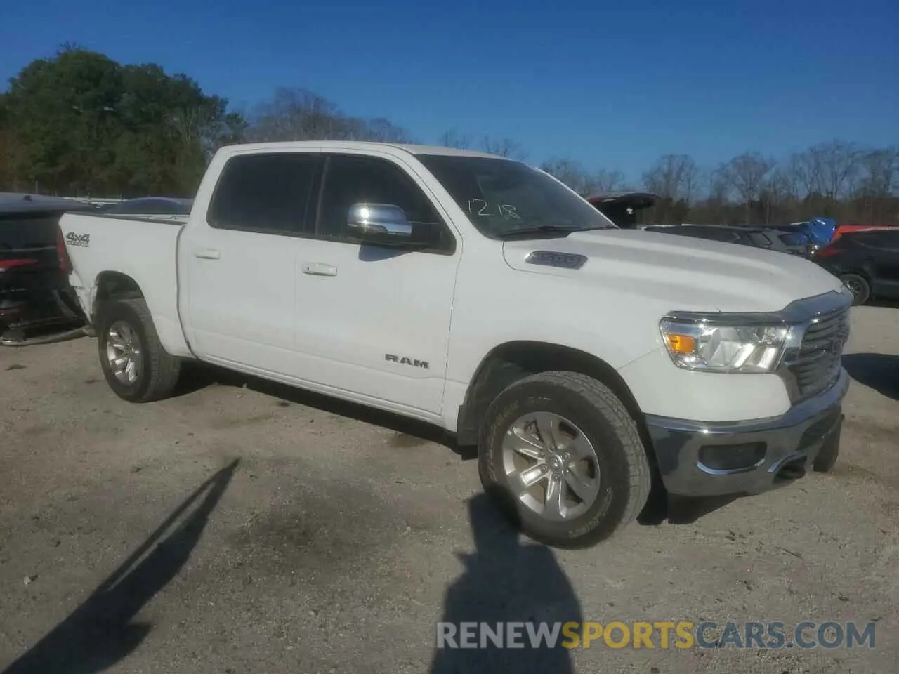 4 Photograph of a damaged car 1C6RRFJG8PN620398 RAM 1500 2023