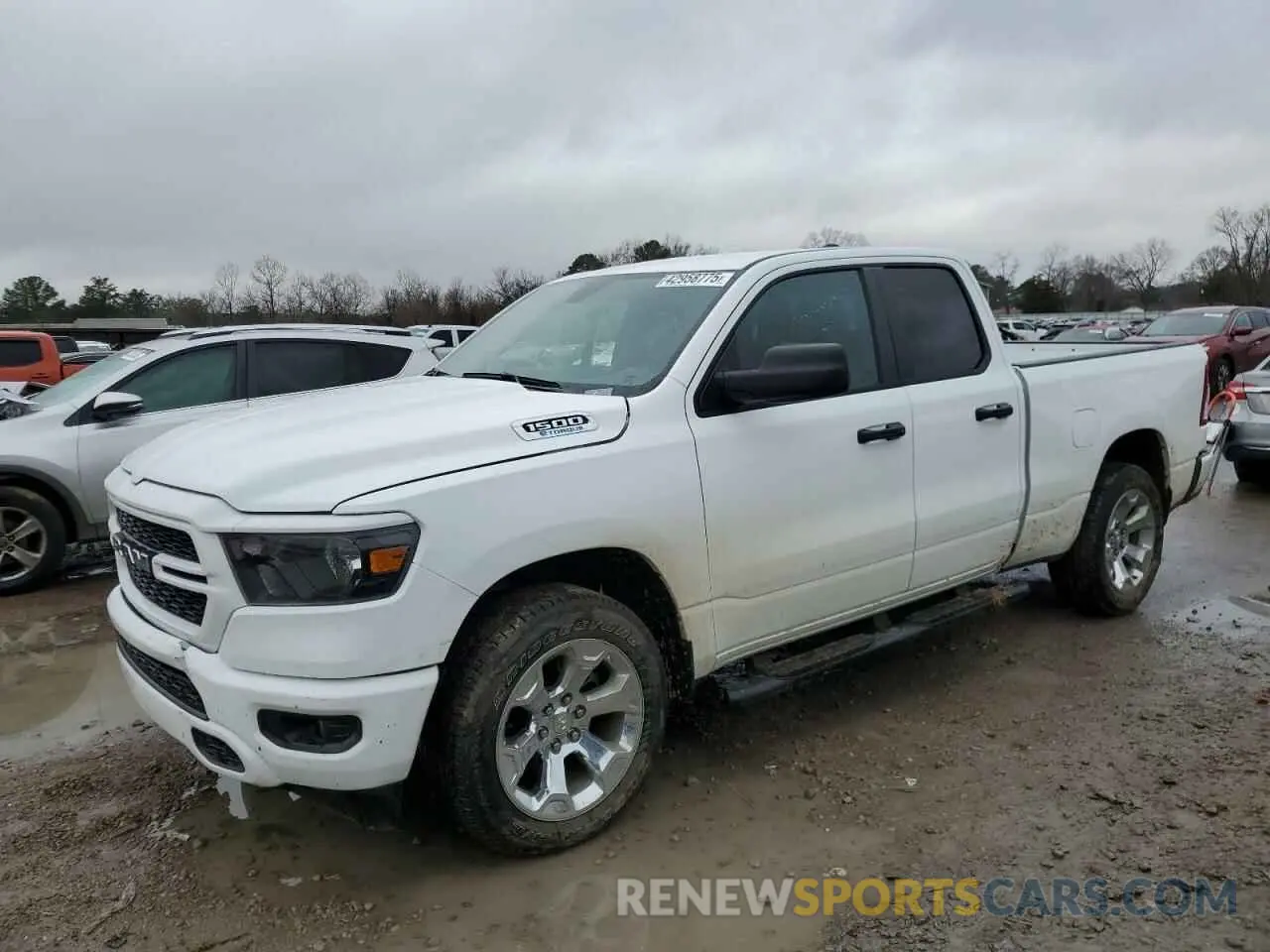 1 Photograph of a damaged car 1C6SRECG9PN693711 RAM 1500 2023
