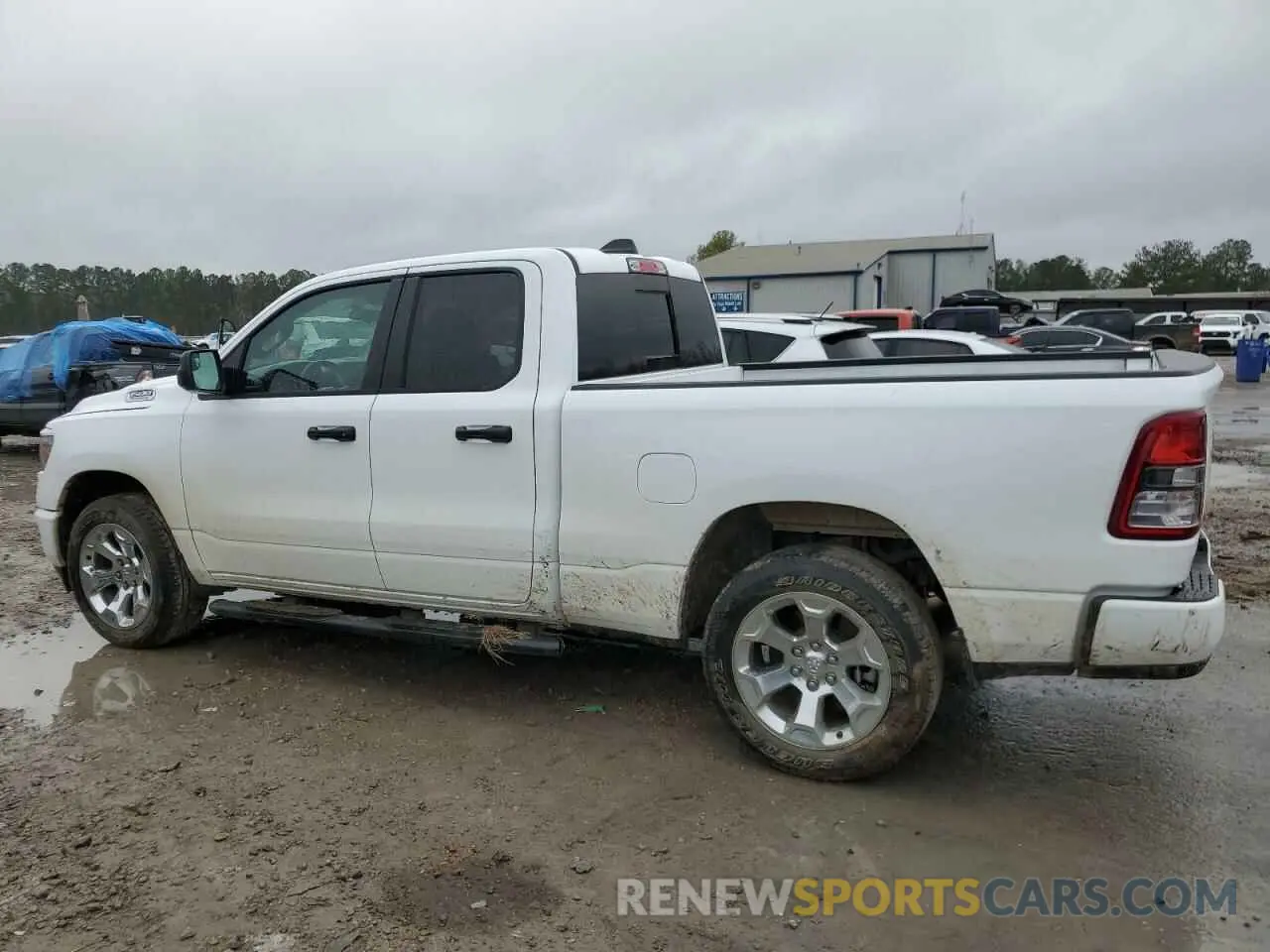2 Photograph of a damaged car 1C6SRECG9PN693711 RAM 1500 2023