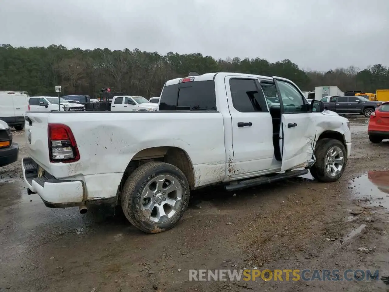 3 Photograph of a damaged car 1C6SRECG9PN693711 RAM 1500 2023