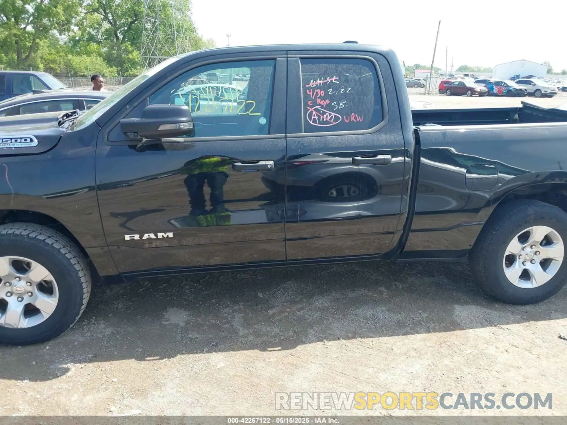 14 Photograph of a damaged car 1C6SRFBT0PN535391 RAM 1500 2023