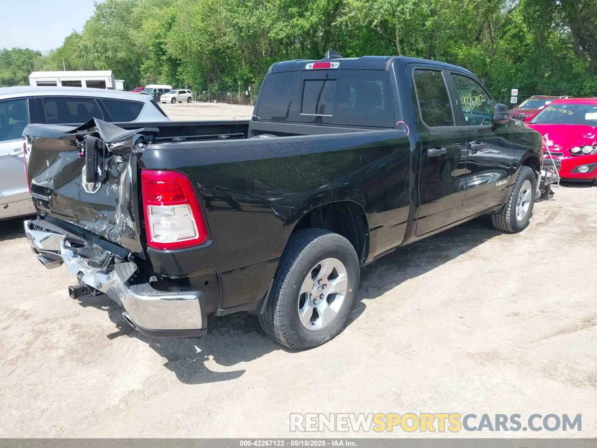 4 Photograph of a damaged car 1C6SRFBT0PN535391 RAM 1500 2023