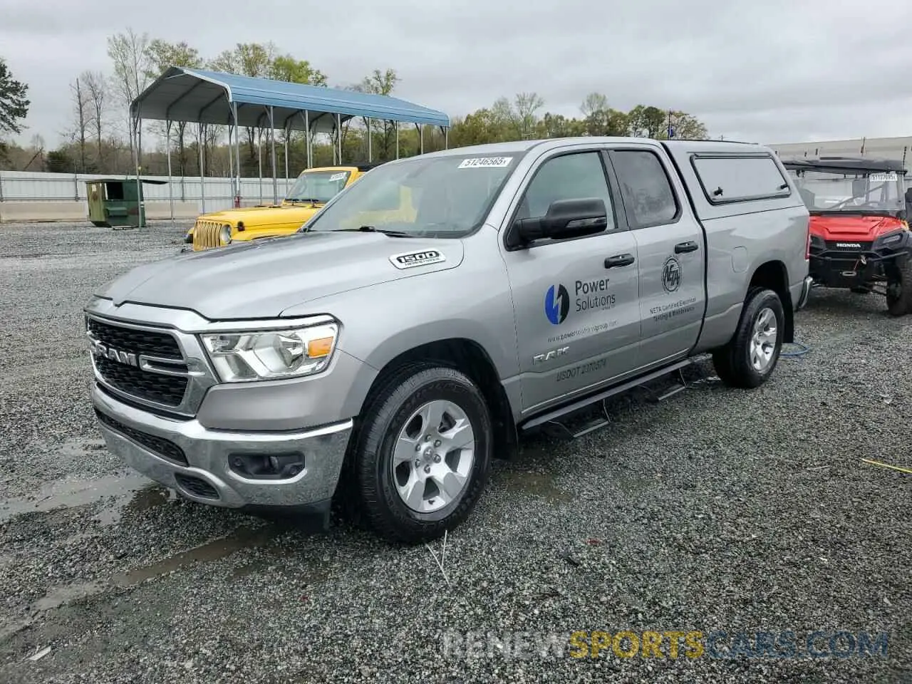 1 Photograph of a damaged car 1C6SRFBT0PN627388 RAM 1500 2023