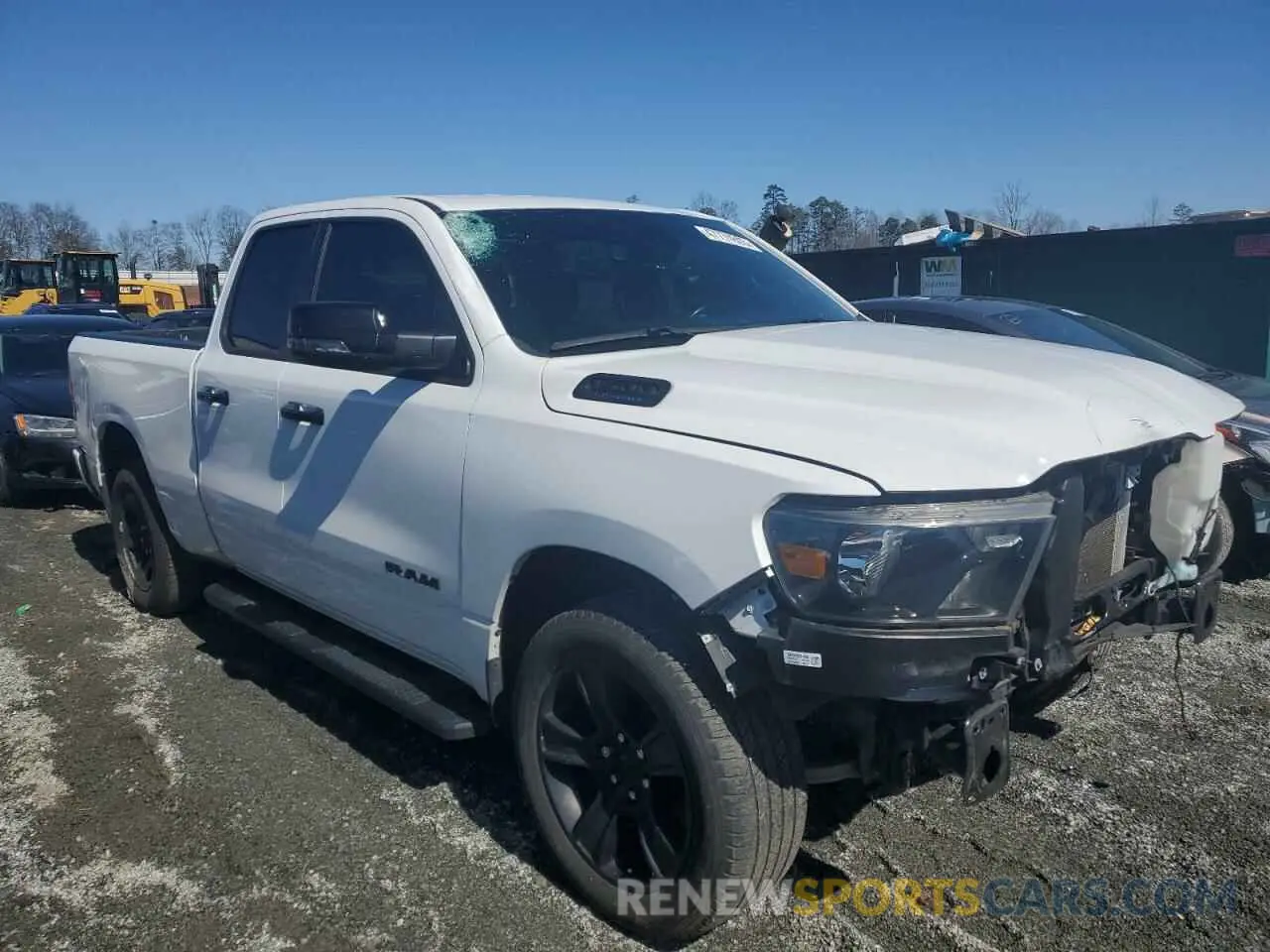 4 Photograph of a damaged car 1C6SRFBT1PN590786 RAM 1500 2023