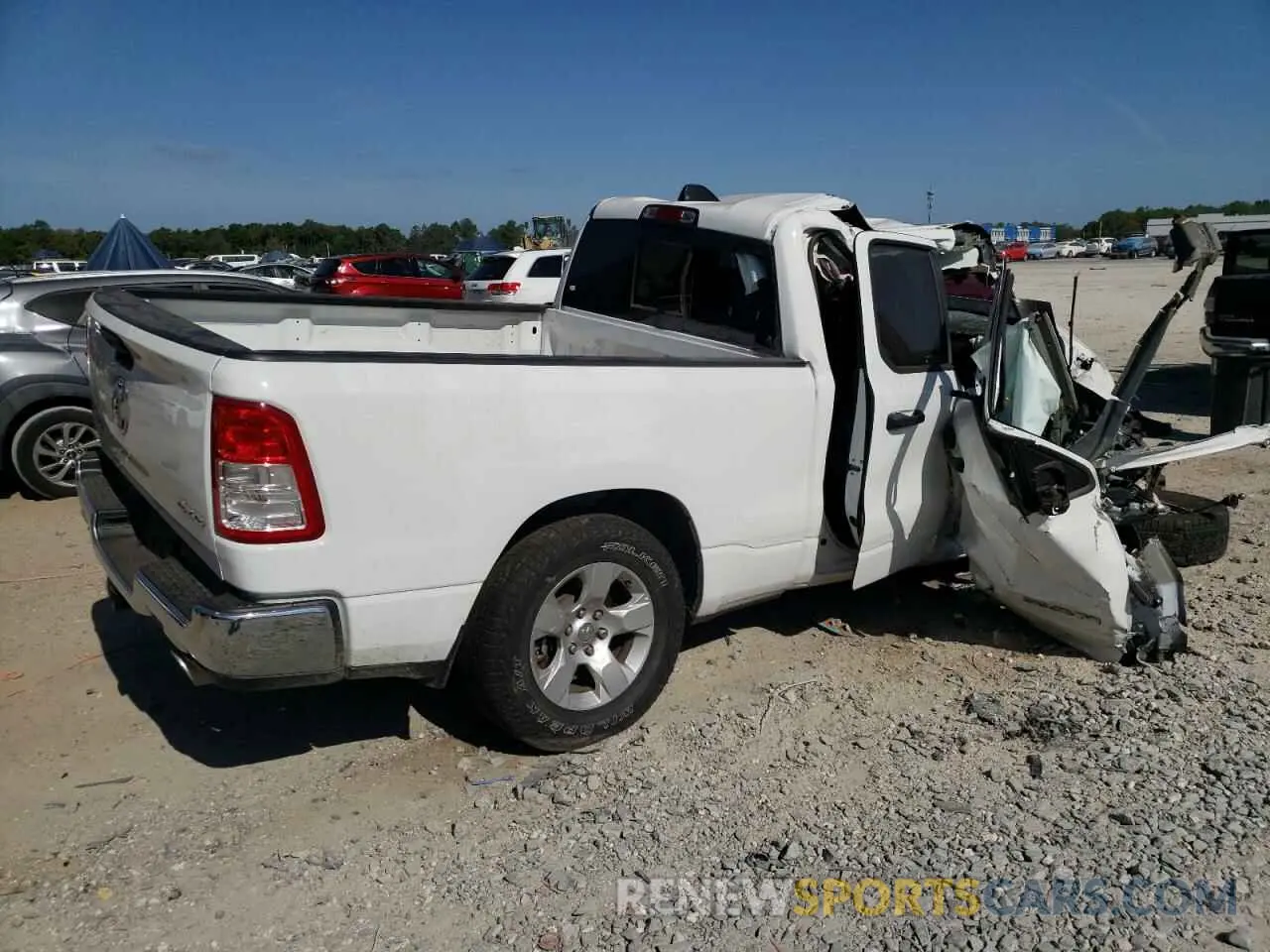 3 Photograph of a damaged car 1C6SRFBT3PN556882 RAM 1500 2023