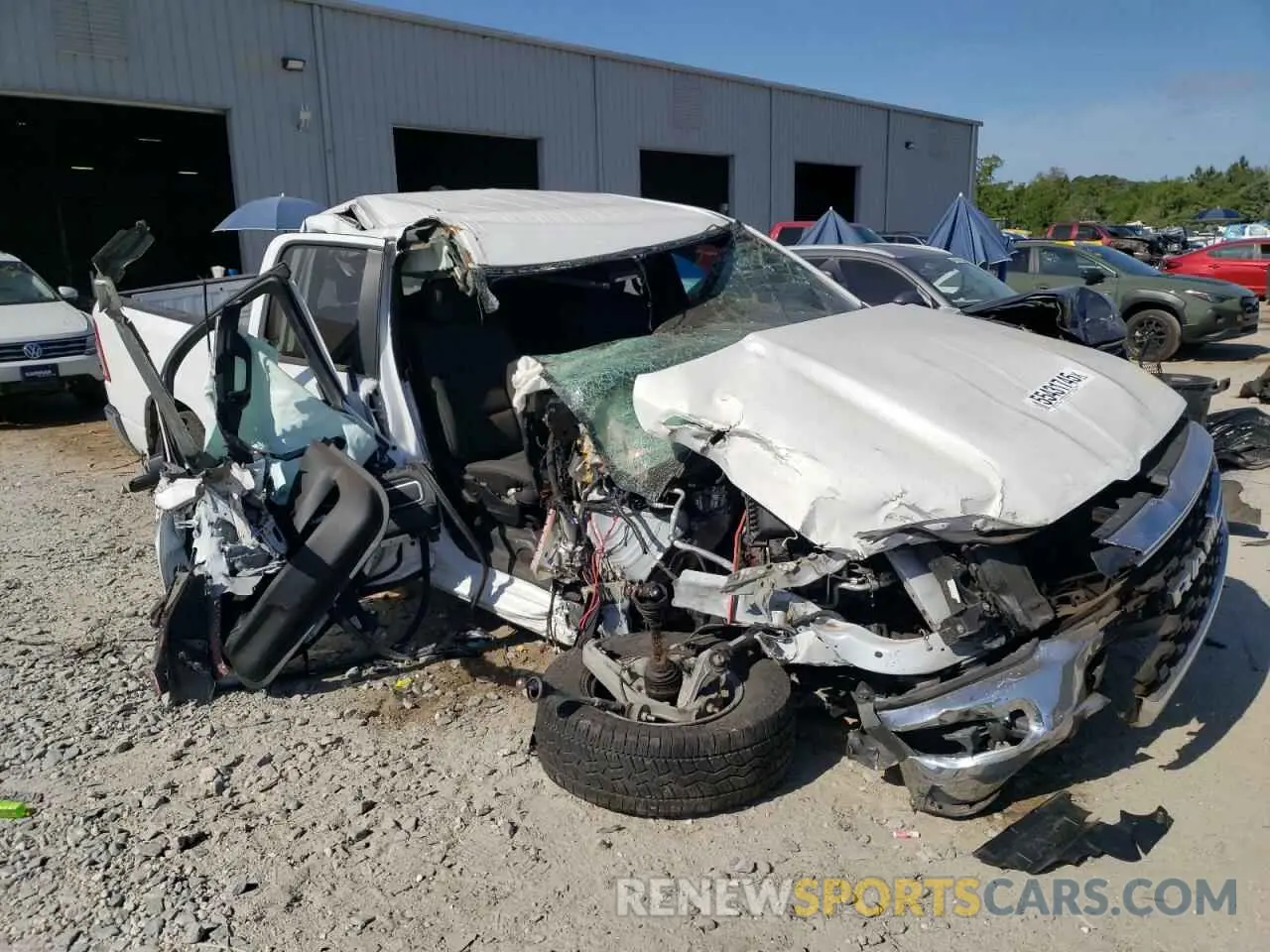 4 Photograph of a damaged car 1C6SRFBT3PN556882 RAM 1500 2023