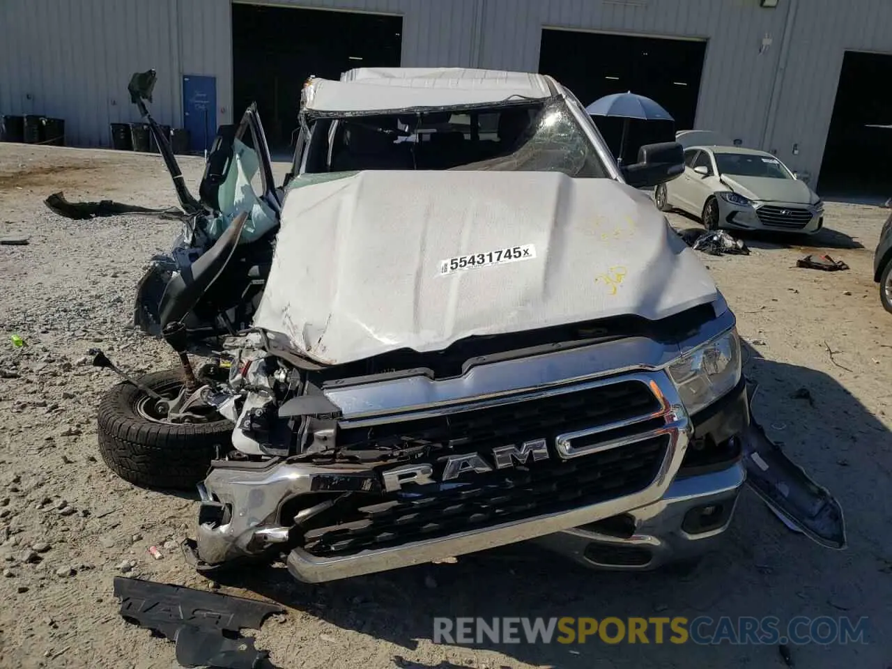 5 Photograph of a damaged car 1C6SRFBT3PN556882 RAM 1500 2023