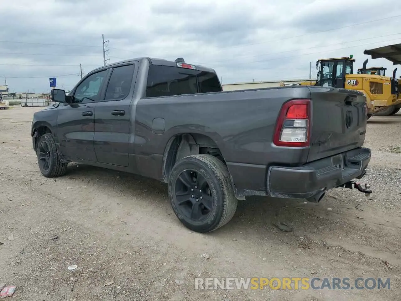 2 Photograph of a damaged car 1C6SRFBT4PN557989 RAM 1500 2023